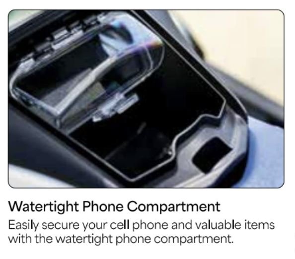 A black waterproof phone compartment in a car's center console with a transparent lid for securing cell phones and valuables.