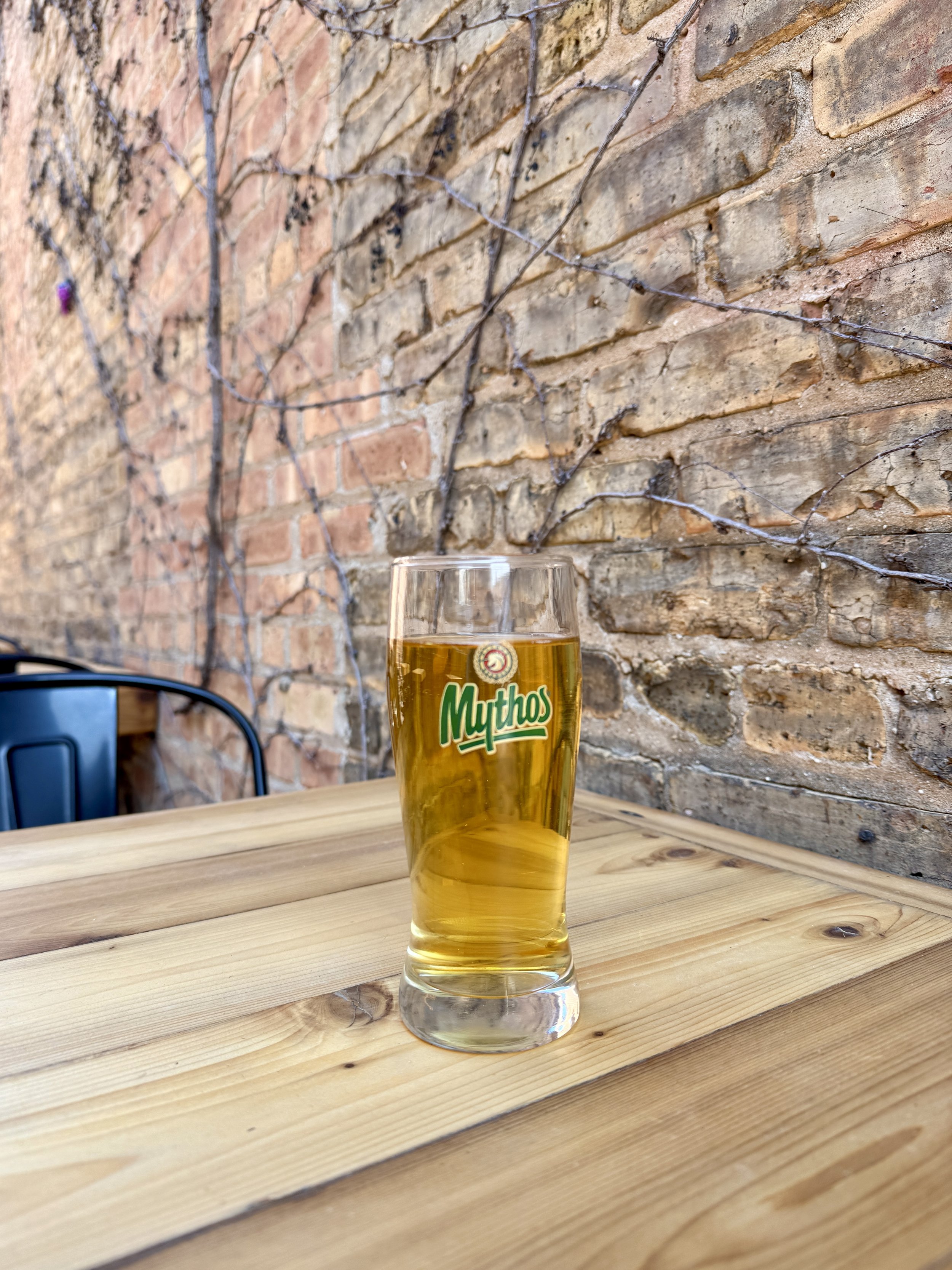 mythos beer on patio
