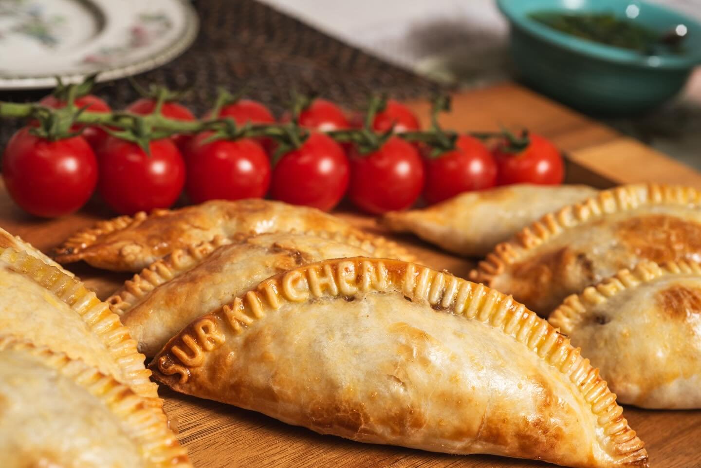Stamped with flavor, sealed with love. ✨
Every Sur Kitchen empanada carries our name&mdash;and our promise of quality in every bite.