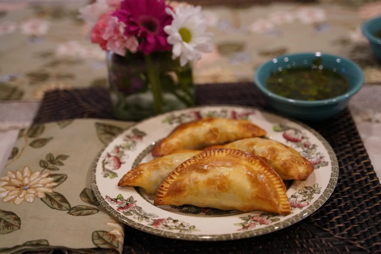 Fresh out of the oven and ready to enjoy. Nothing beats a plate of homemade empanadas. 🧡
