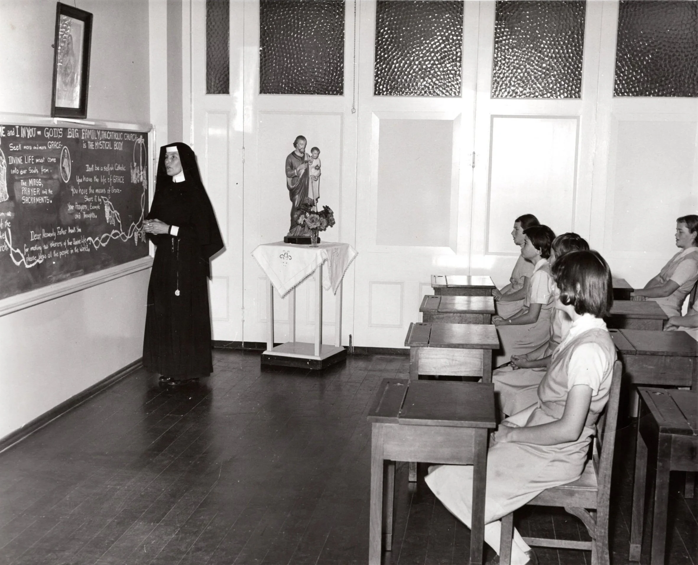 Loreto Sister Lucy Stansfield teaching students in a classroom, reflecting the tradition of Loreto education in Australia