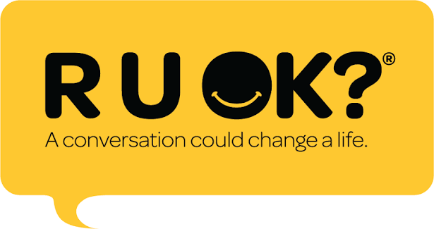 Yellow R U OK? logo with the tagline “A conversation could change a life.”