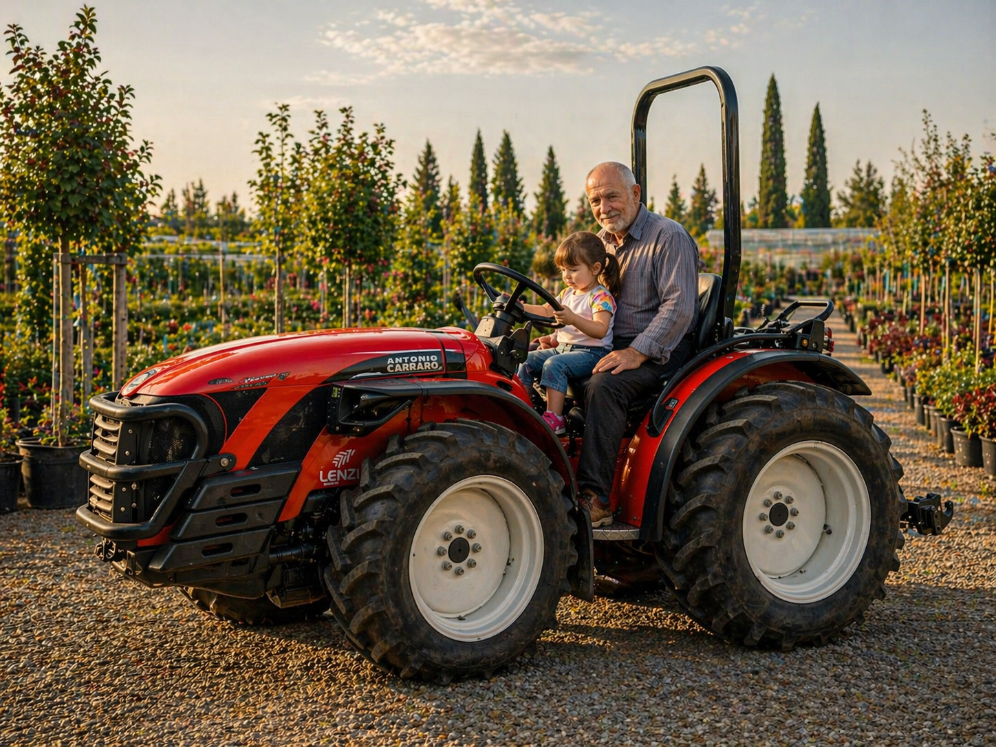 An elderly man and a young girl riding a red tractor through a nursery filled with flowering plants and trees, during late afternoon or early evening.