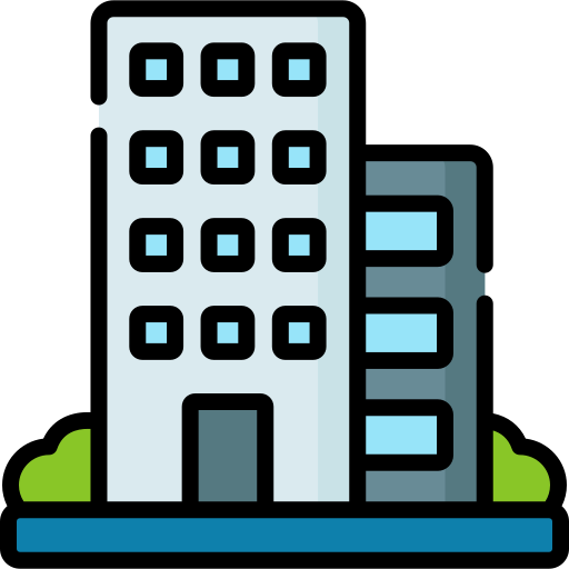 Icon of a tall office building with multiple windows, surrounded by small bushes and situated next to a sidewalk.