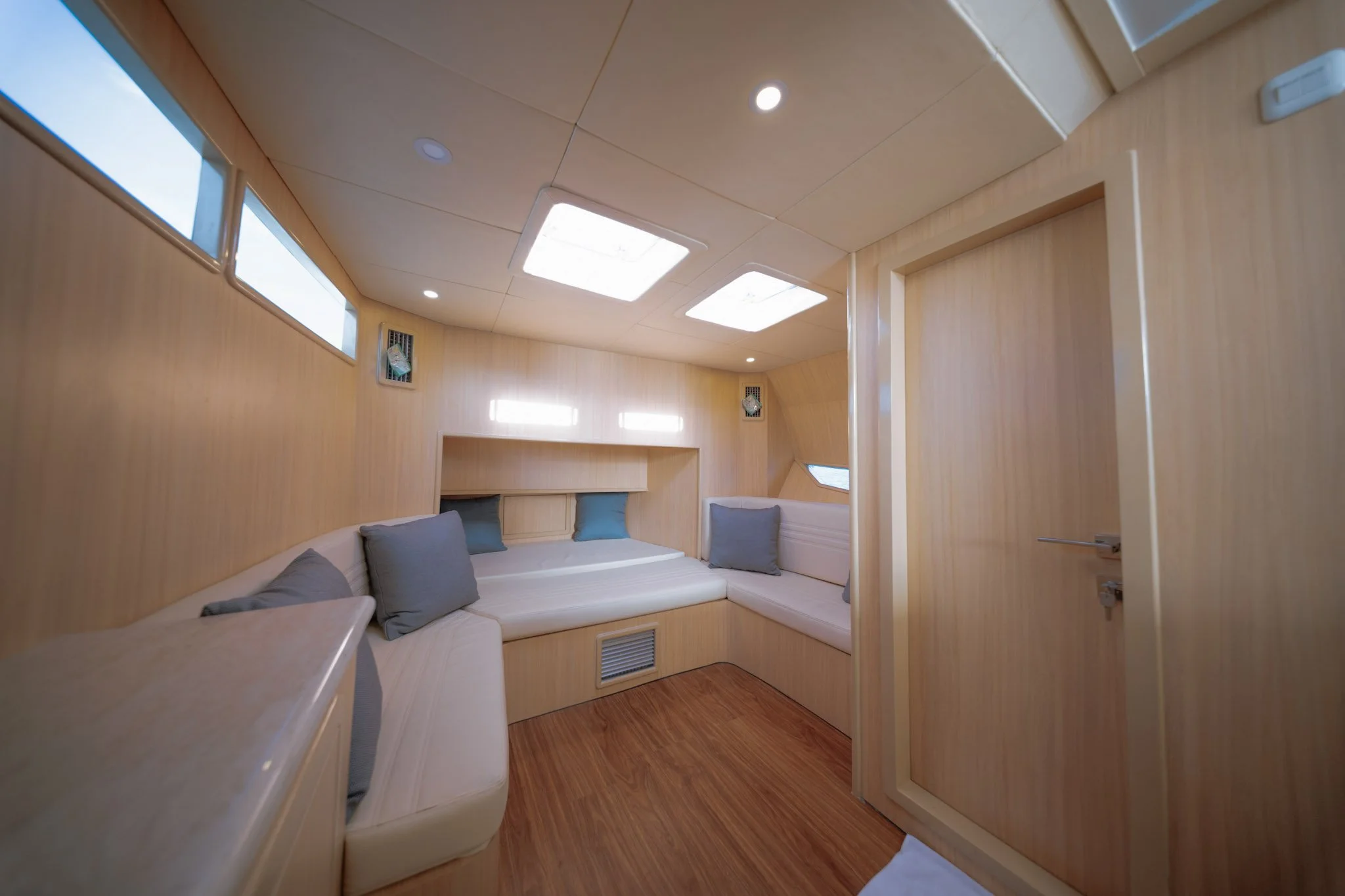 Air-conditioned cabin and bathroom area aboard the Kalm Charters private charter vessel.