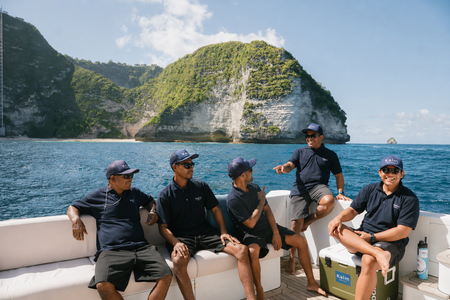 The Kalm Charters crew aboard the vessel near Nusa Penida.
