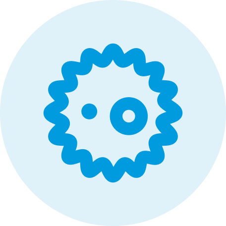 Illustration of a virus with a wavy outline and two dots for eyes, and a larger dot for a mouth.
