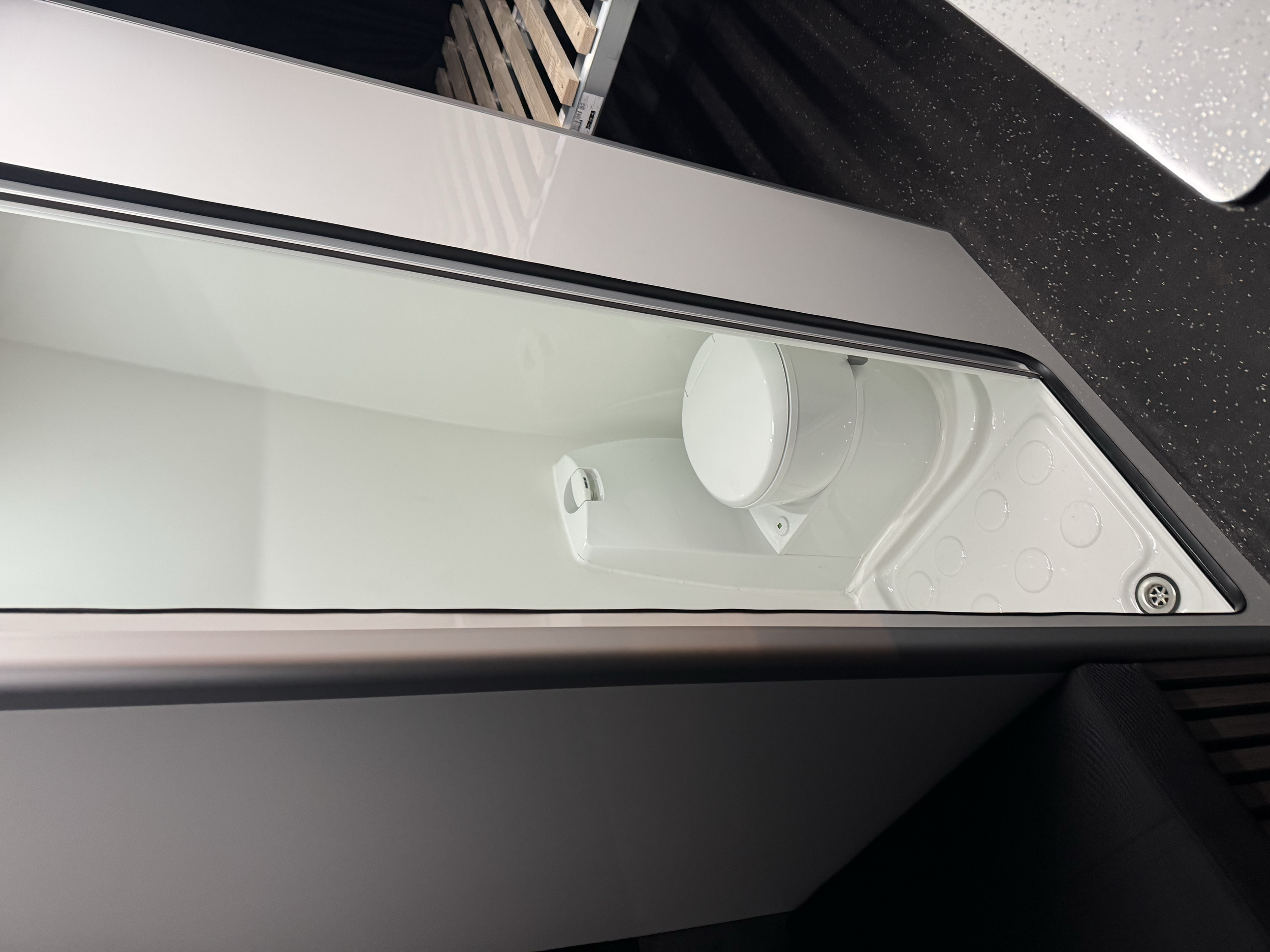 Full size integrated toilet.