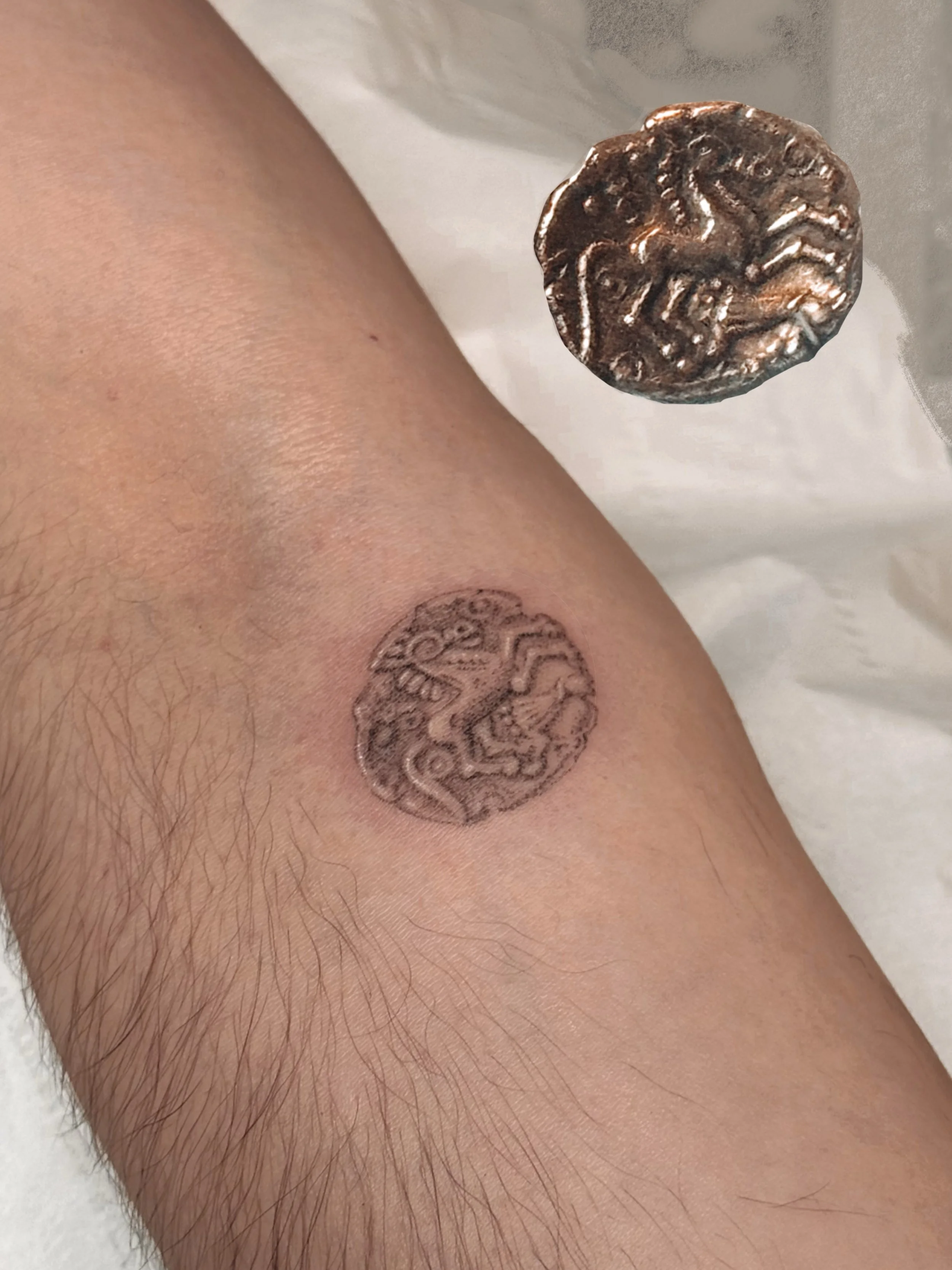 Tapping in hundreds of fine dots of ink and carefully wiping away tiny areas of the stencil to reveal the progress of this Celtic coin tattoo felt as close as I&rsquo;ll ever get to being an archaeologist. My experiance tattooing museum artefacts wit