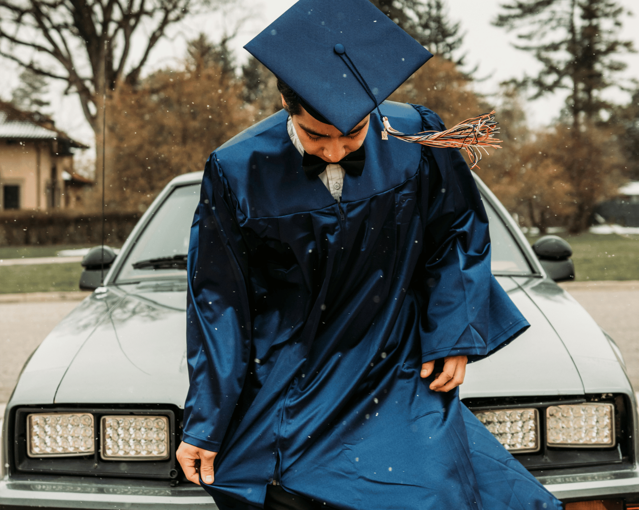 Image of a recent CTE graduate in a gap and gown
