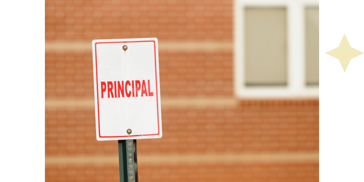 An image of a well used principal parking sign. Like in front of a school.