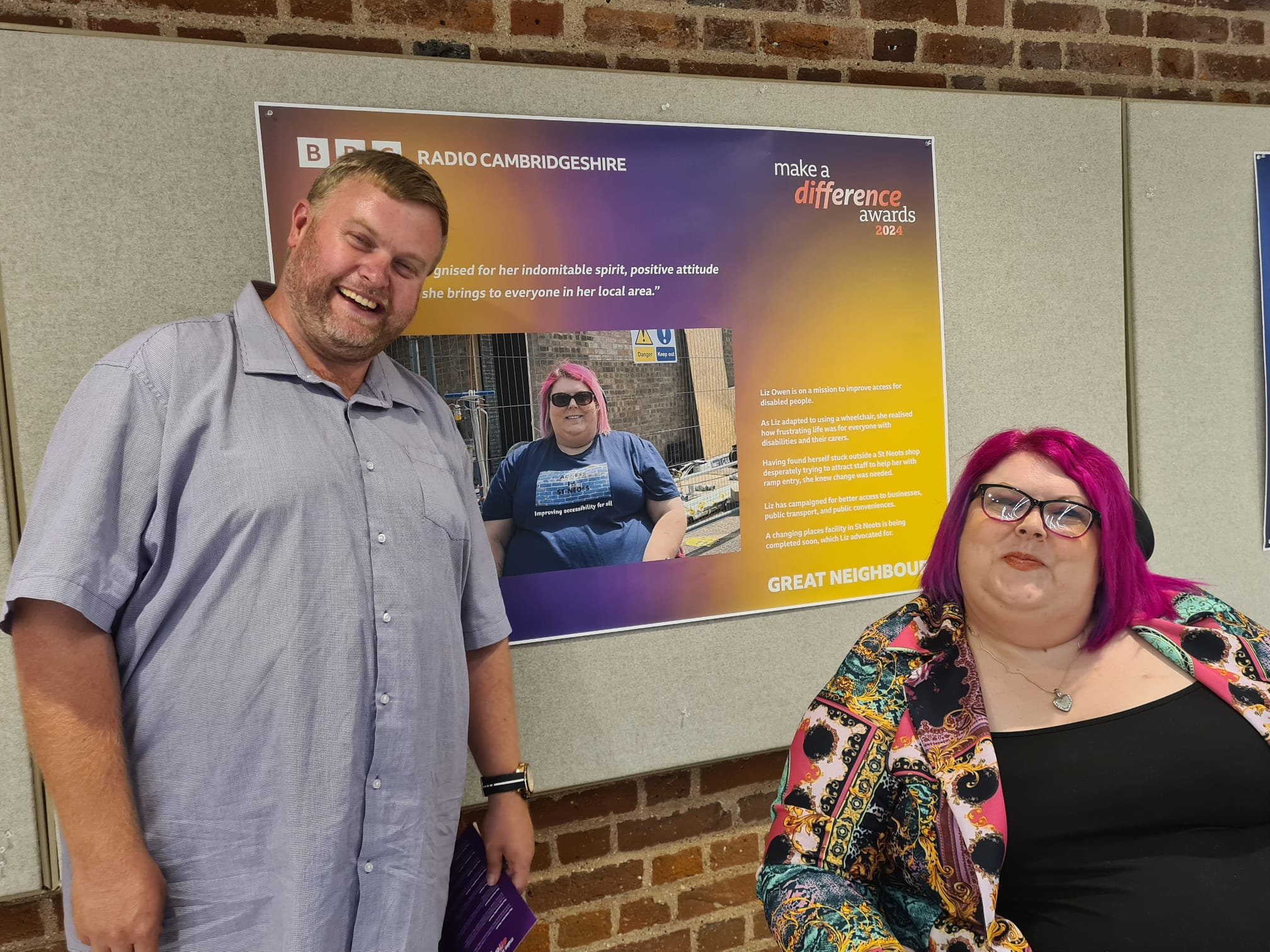 Myself and my husband in front of my display board