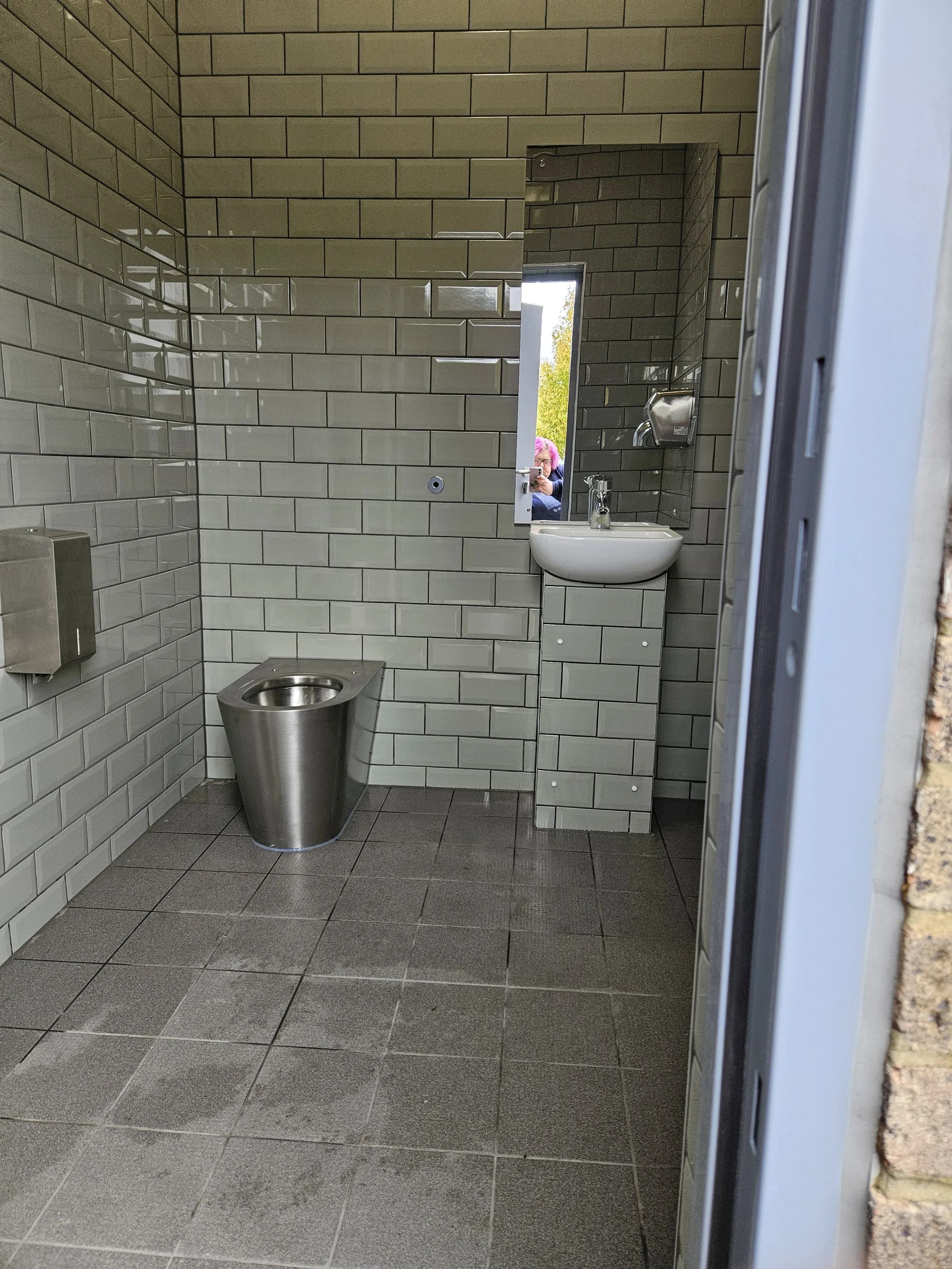 The other toilets were also refurbished. They are all unisex now.