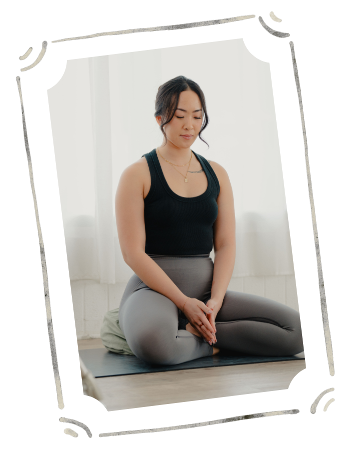 Jamee Leann Vasquez sits on a yoga mat and hosts a restorative reiki session in Santa Clara.