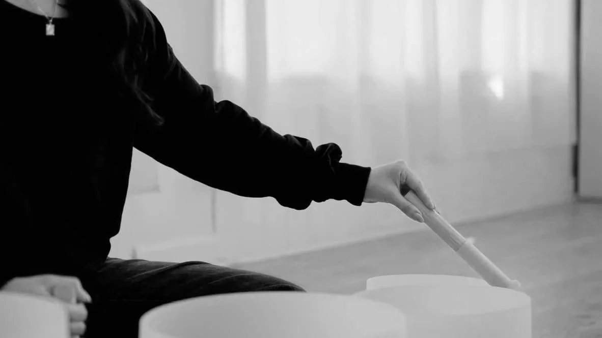 Jamee Leann Vasquez, Flourish & Flow founder, plays sound bath bowls.