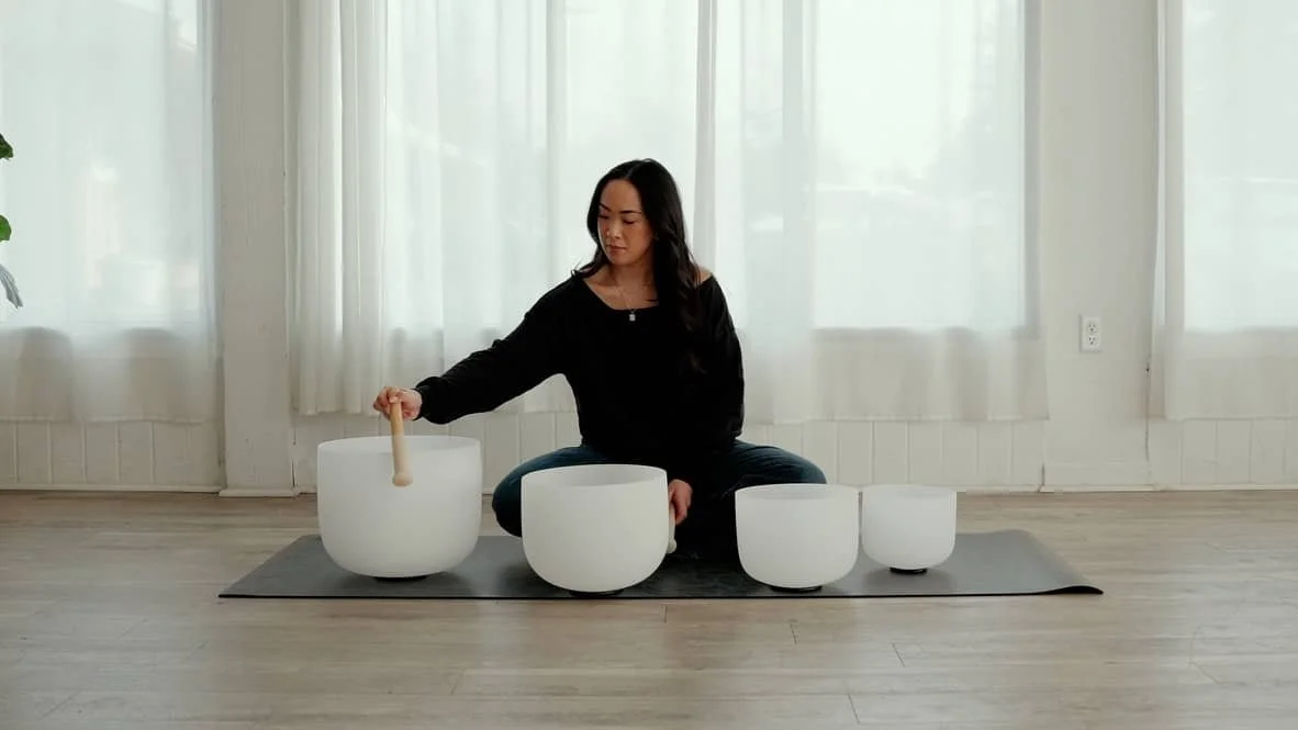 Flourish & Flow founder Jamee Leann Vasquez plays sound bath bowls.