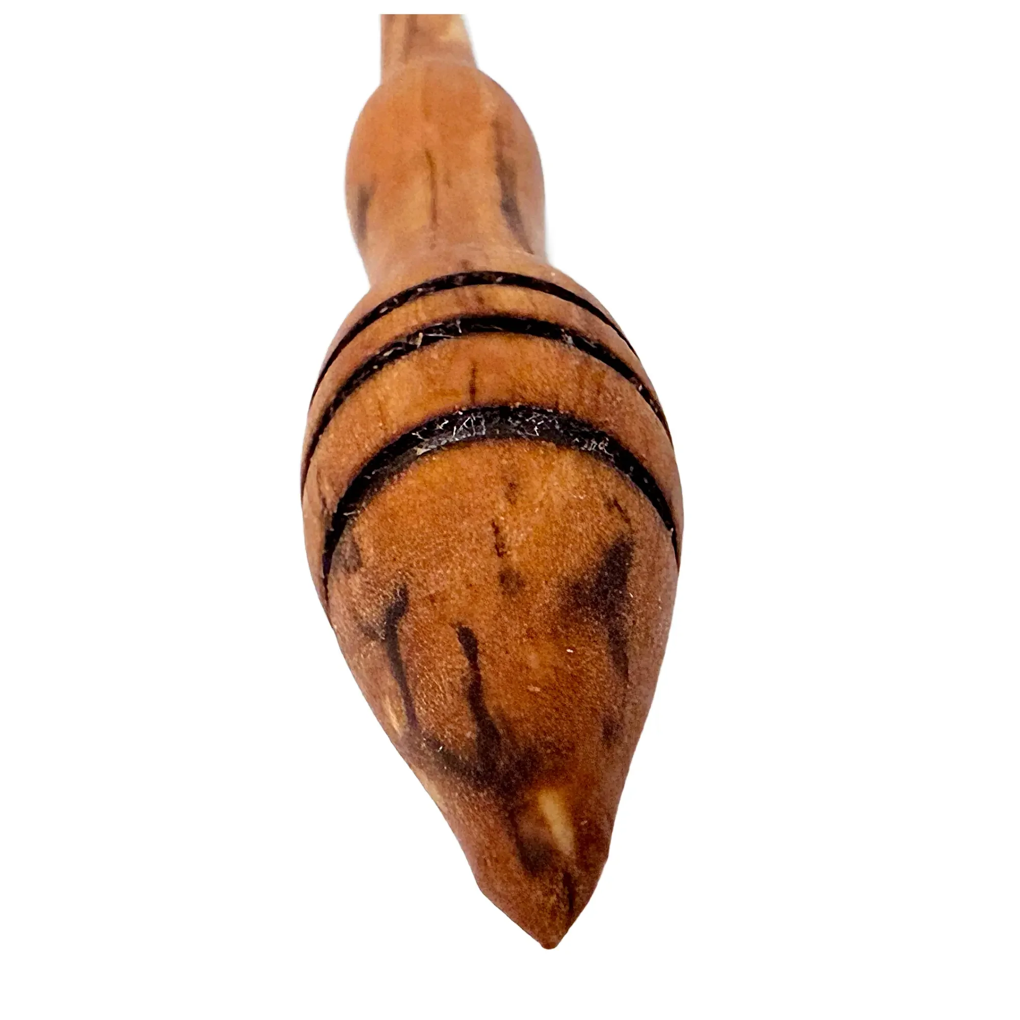 Top view of a handcrafted Austrian apple wood support spindle showing natural grain and signature accent rings.