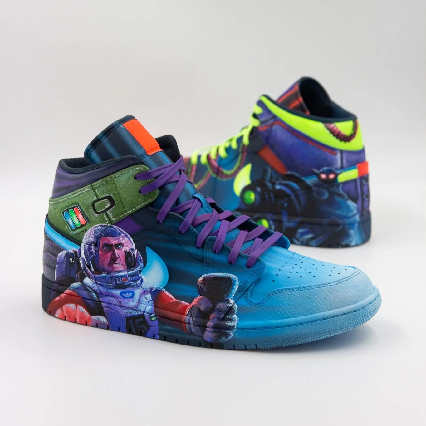 Custom hand-painted sneakers featuring a Buzz Lightyear with a colorful astronaut and futuristic elements.
