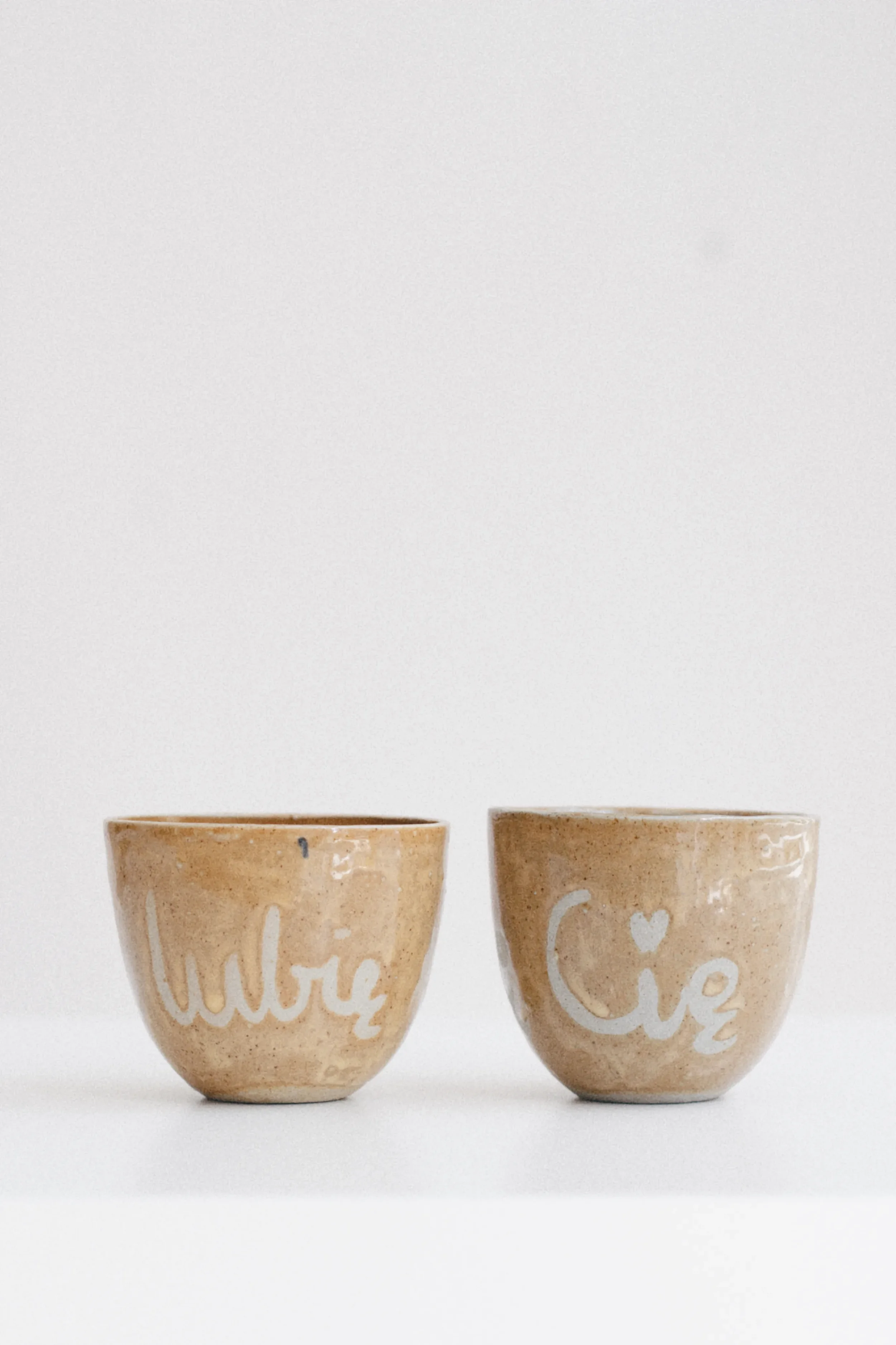 marti-ceramic-studio-beige-ceramic-cups-product-photography.webp