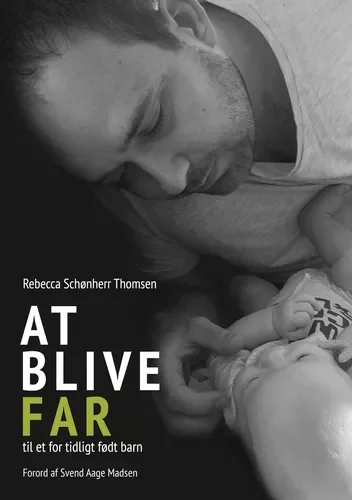 Bogomslag med titel 'At blive far' og billede af en nybagt baby, der bliver holdt af sin far.