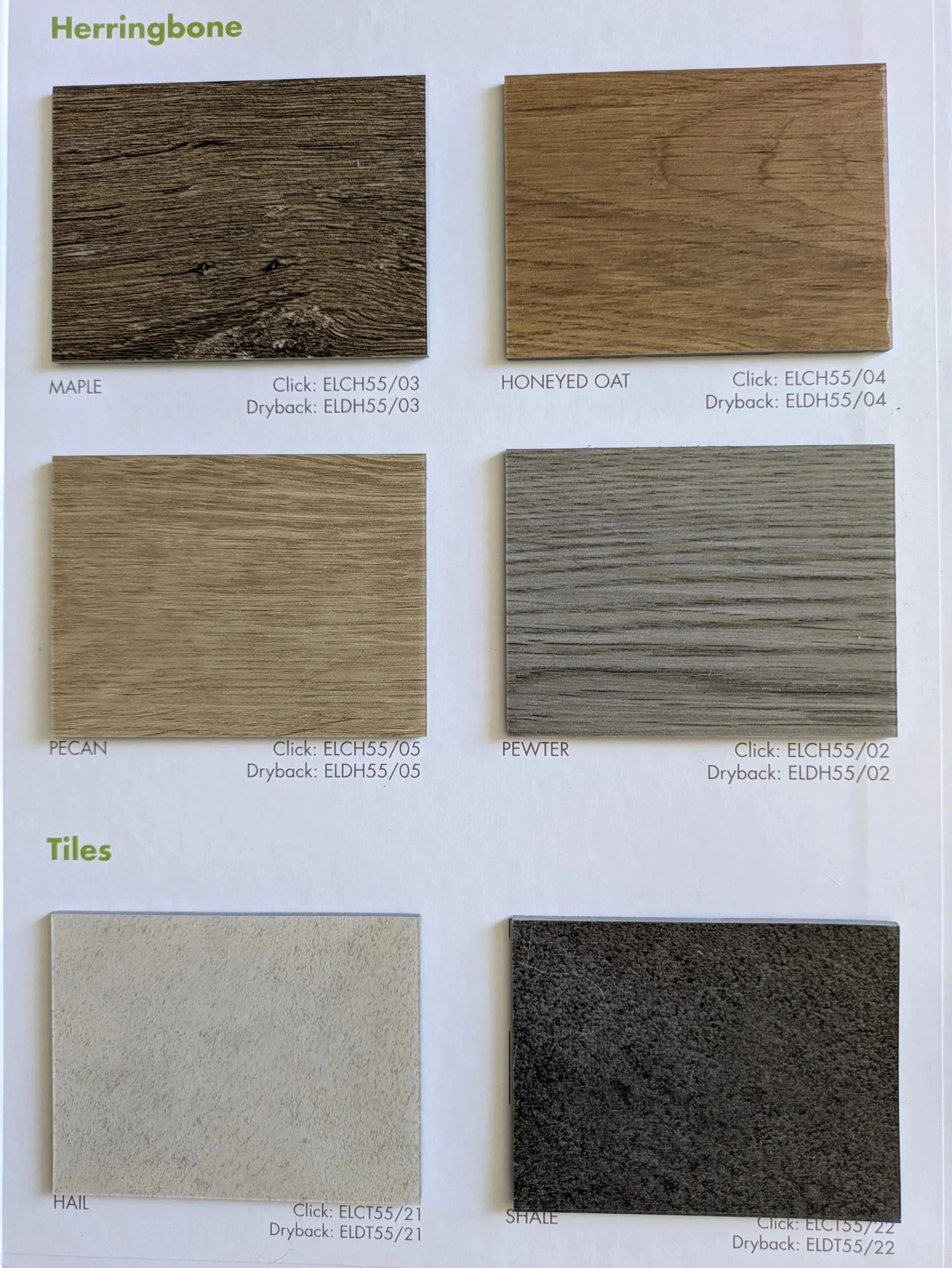 A collection of six wood and tile samples of luxury vinyl tile flooring arranged in two rows. Top row from left to right: dark brown Maple, light brown Honeyed Oat. Bottom row from left to right: light beige Pecan, grayish Pebble.