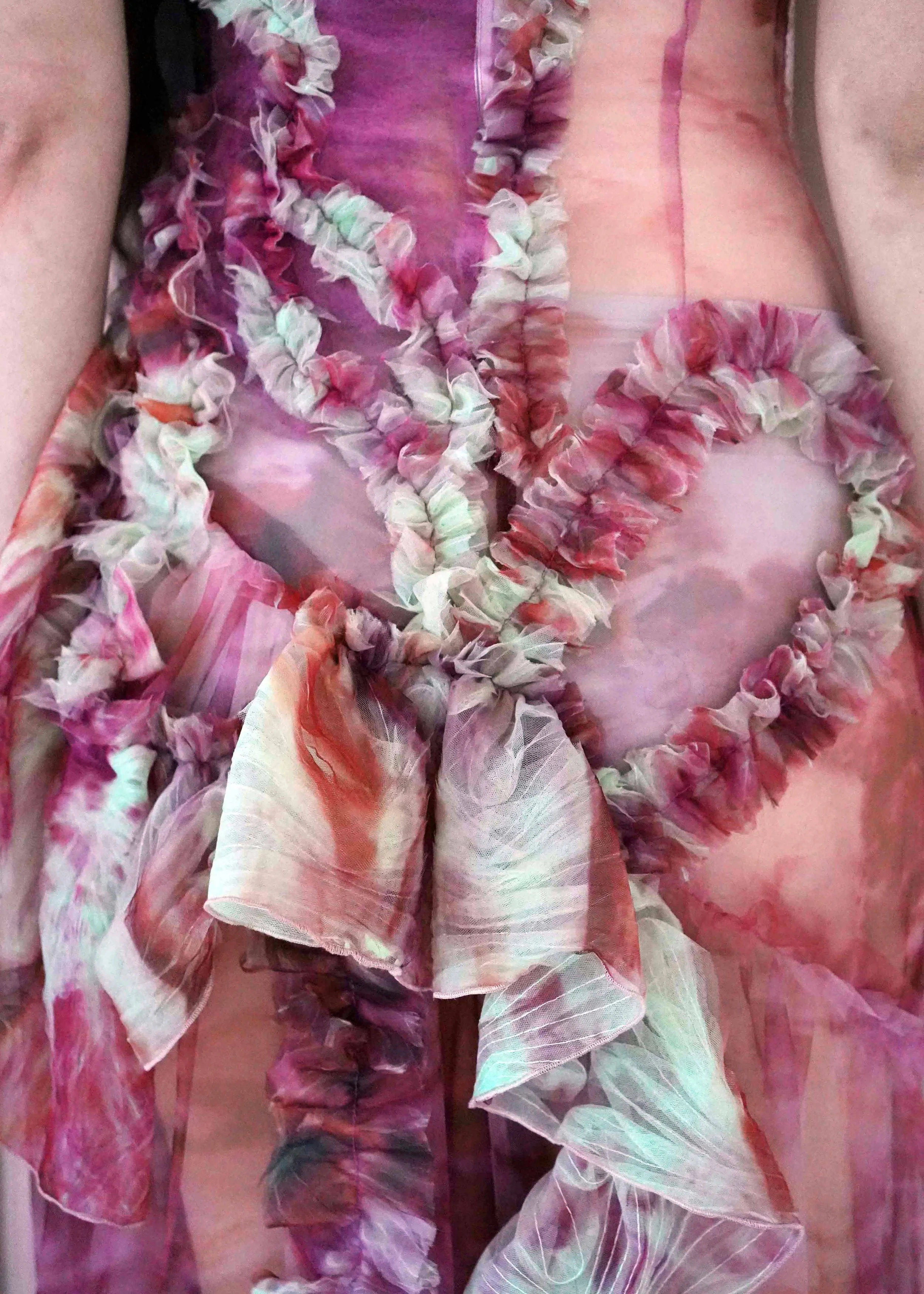Detail of 3D embellished green tulle frills and hand-felted pink wool on the Clara Pinto Flourishing Dress