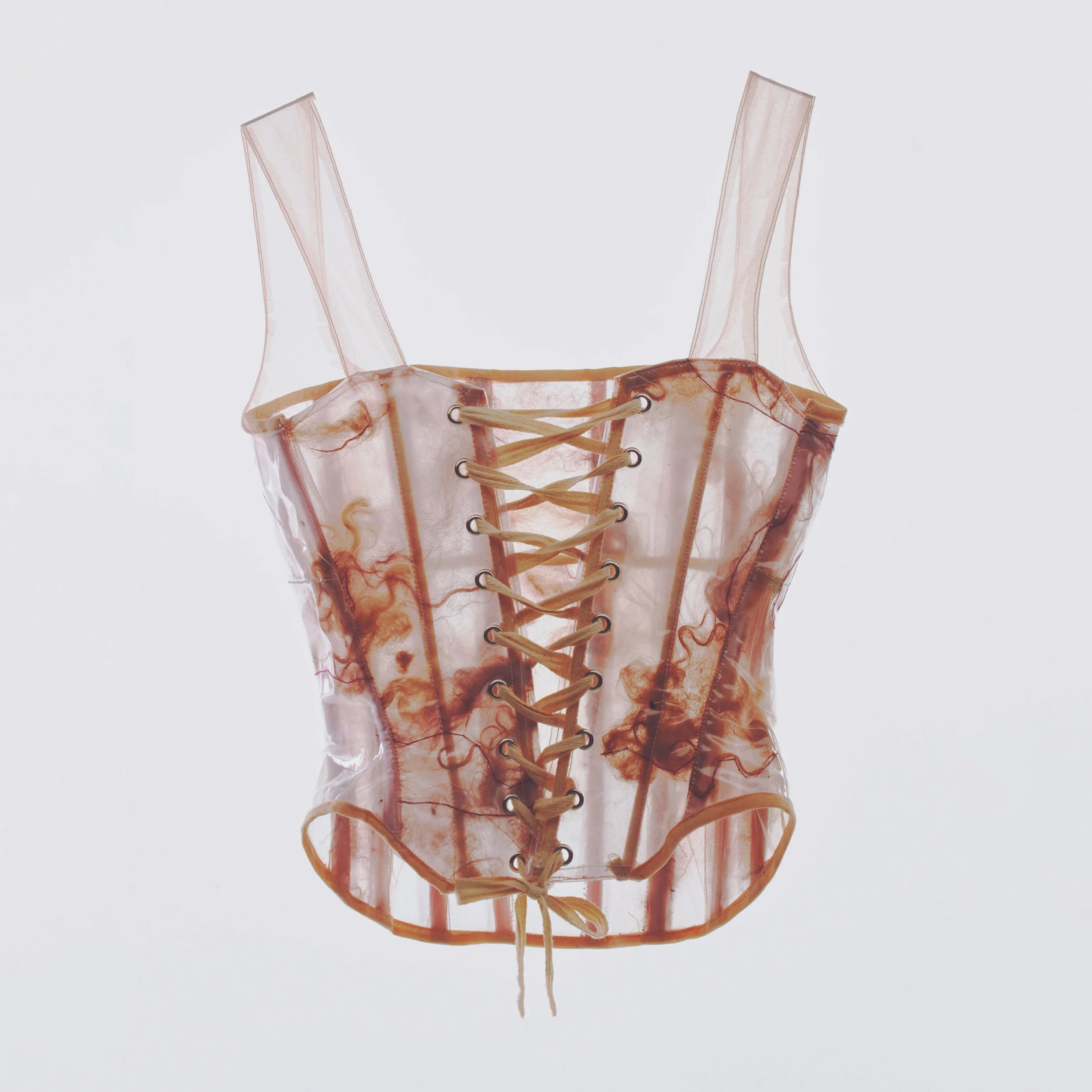 Sheer lace-up corset with brown and orange abstract pattern.