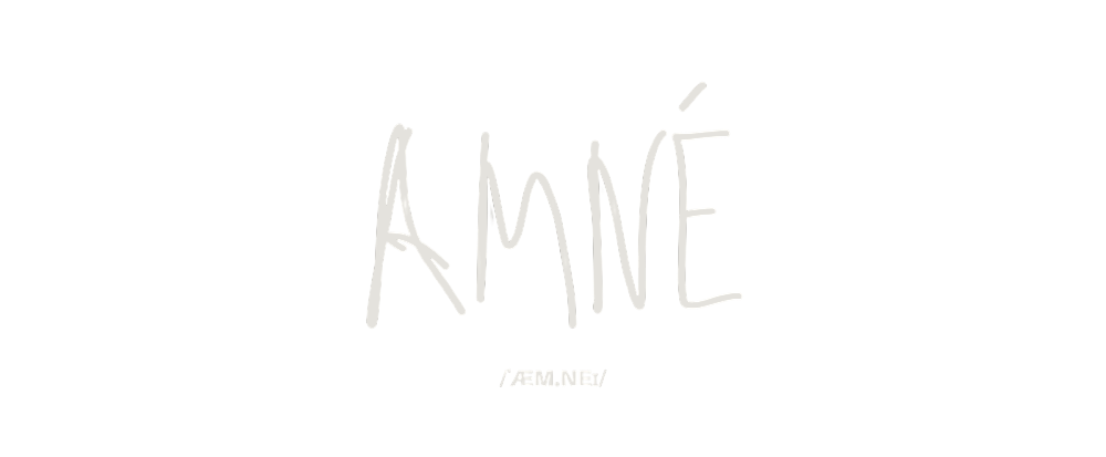 Text that says 'AMNÉ' in a handwritten style on a black background.
