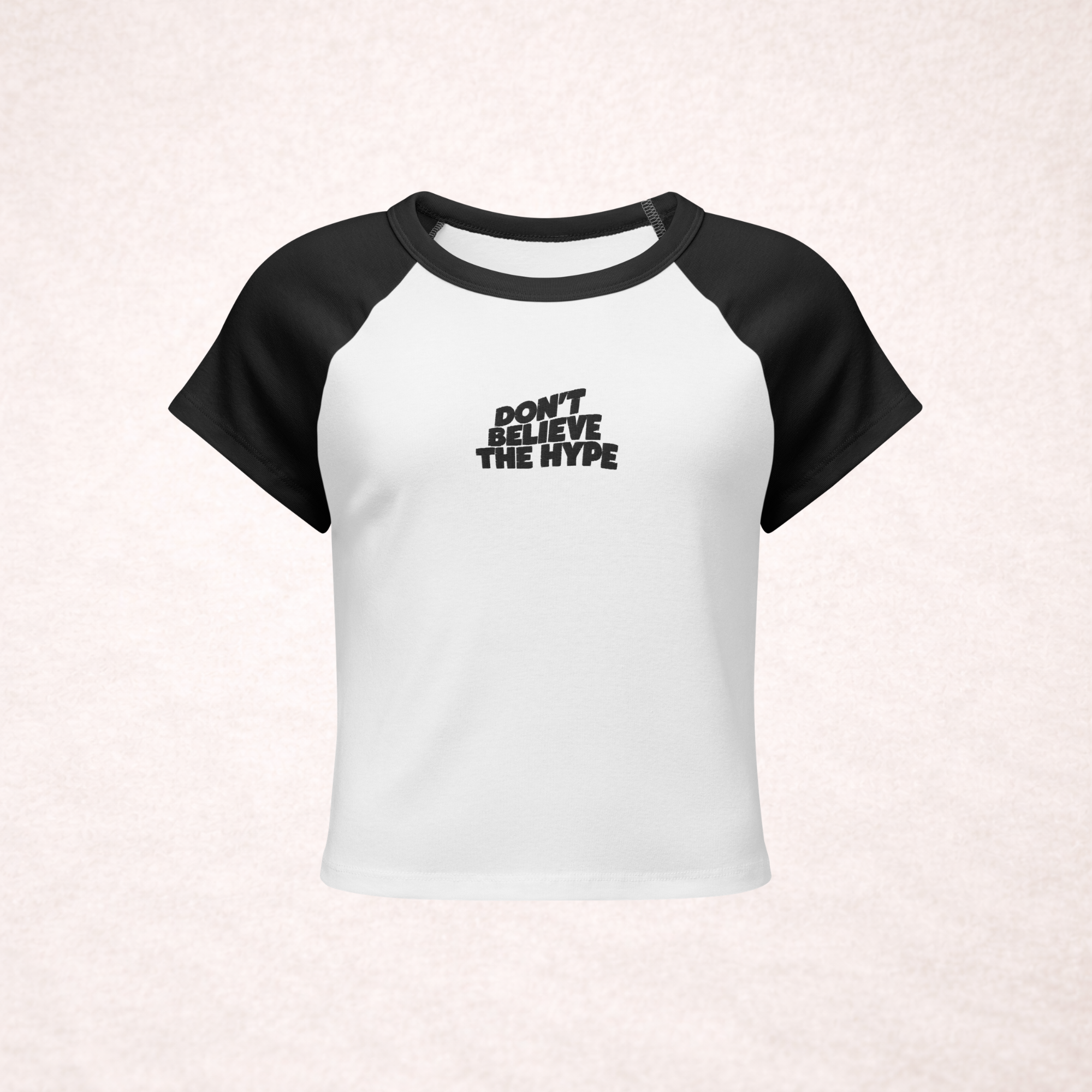 'Don't Believe The Hype' Embroidered Raglan Micro Rib Baby Tee