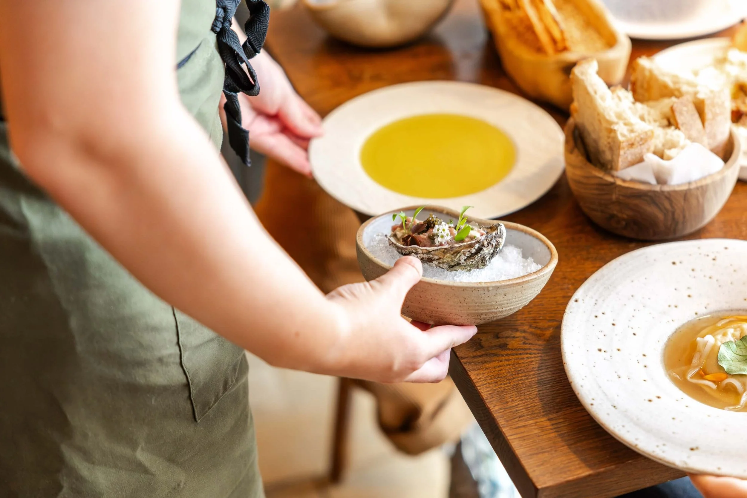 Lovage Jesmond Michelin Guide Waitress serving oysters