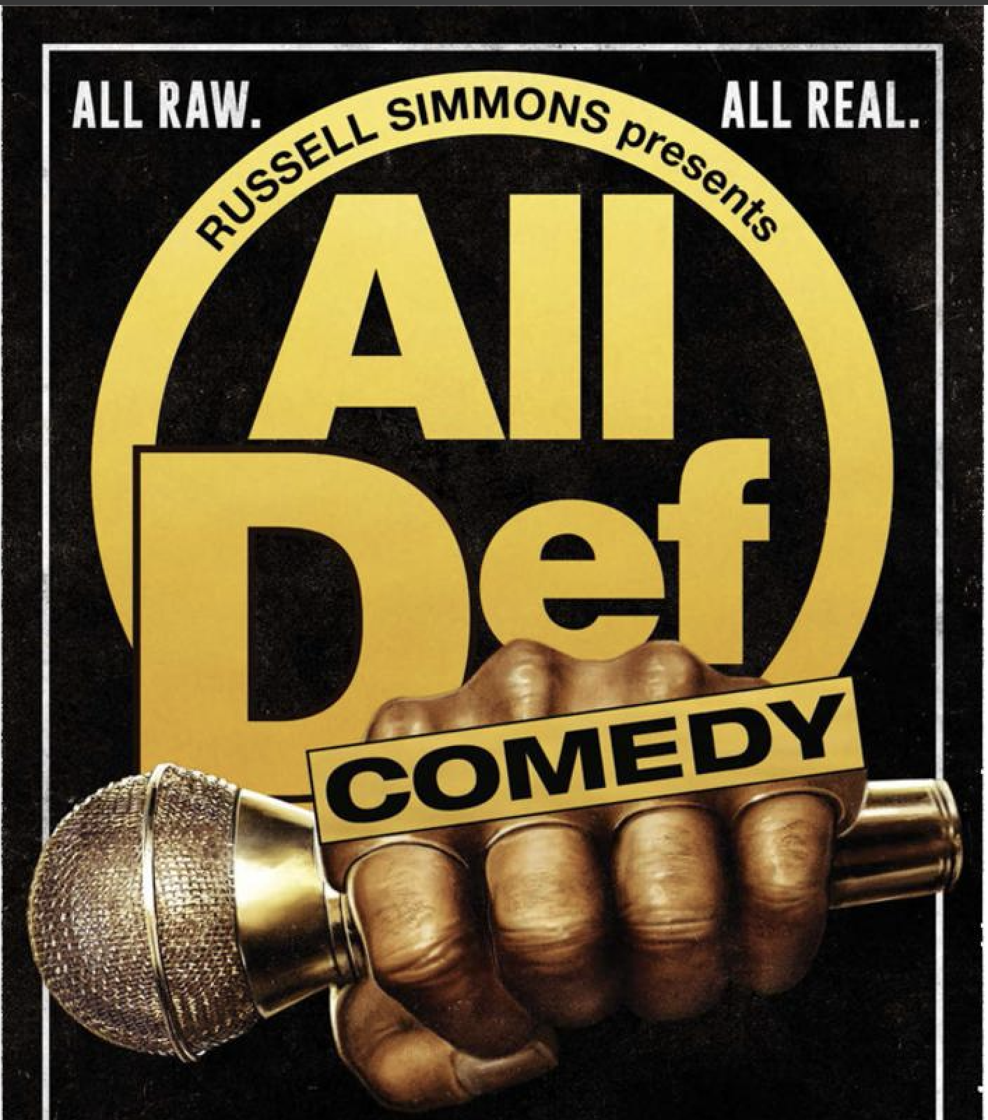 A poster for a comedy show featuring a golden microphone held by a hand, with large yellow and black text that reads "ALL RAW. ALL REAL. RUSSELL SIMMONS presents AID DEF comedy." The background is black with a white border.