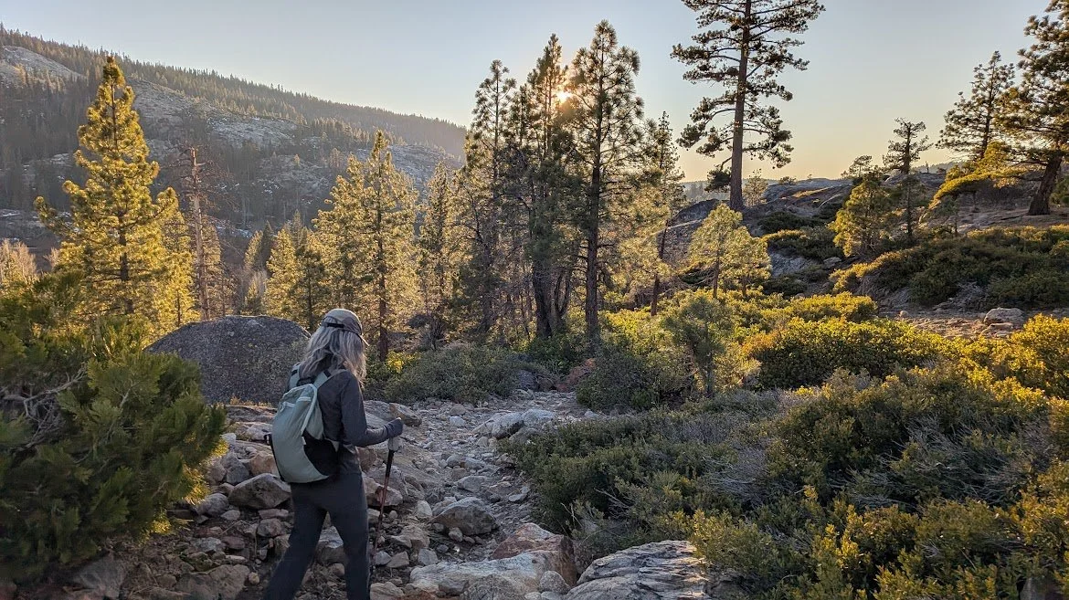 Andrea Broglio hiking at golden hour in the Sierra