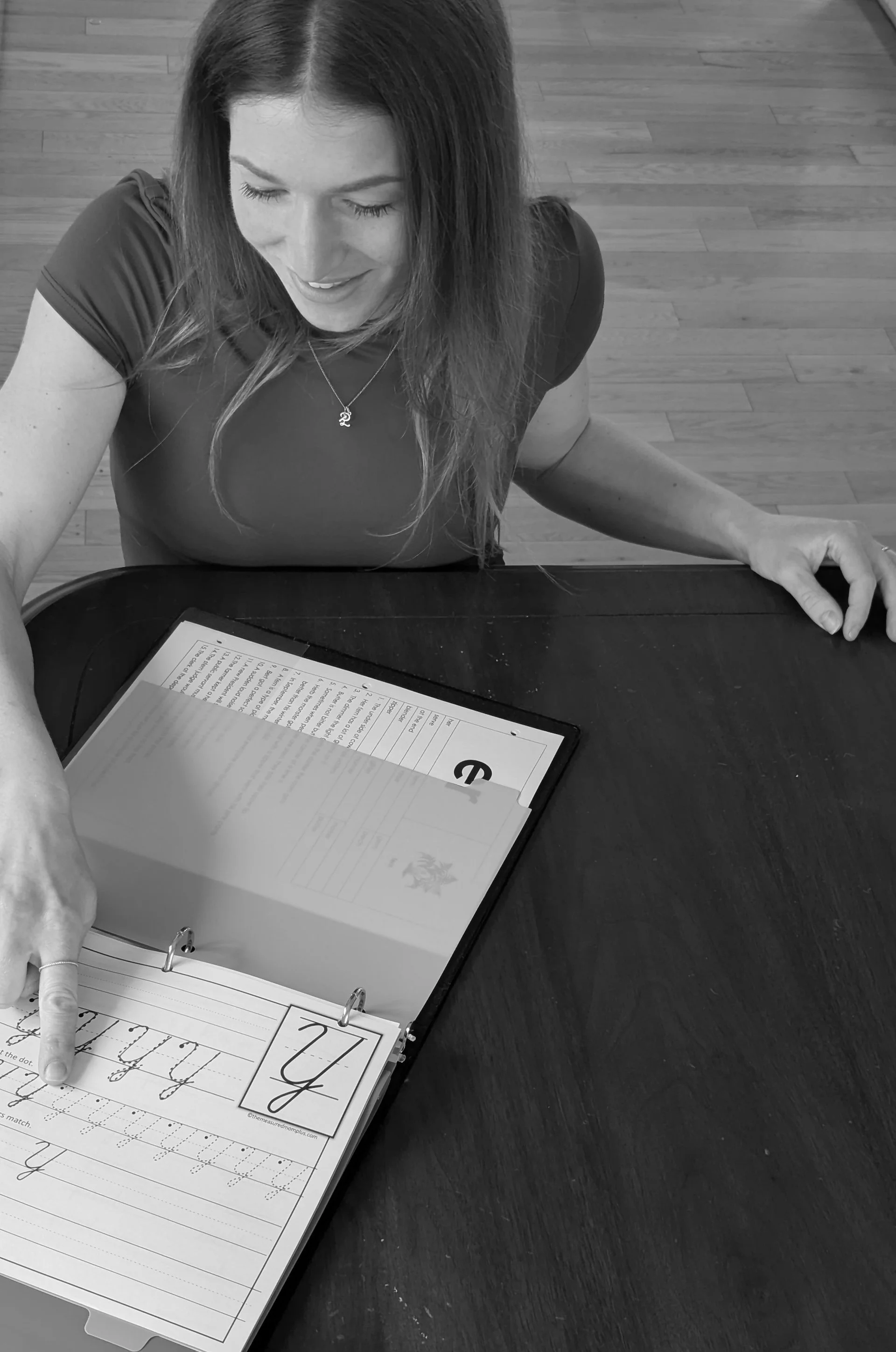 Katia Sutherland, Orton-Gillingham specialist in Halifax, reviewing structured literacy lesson materials with a student