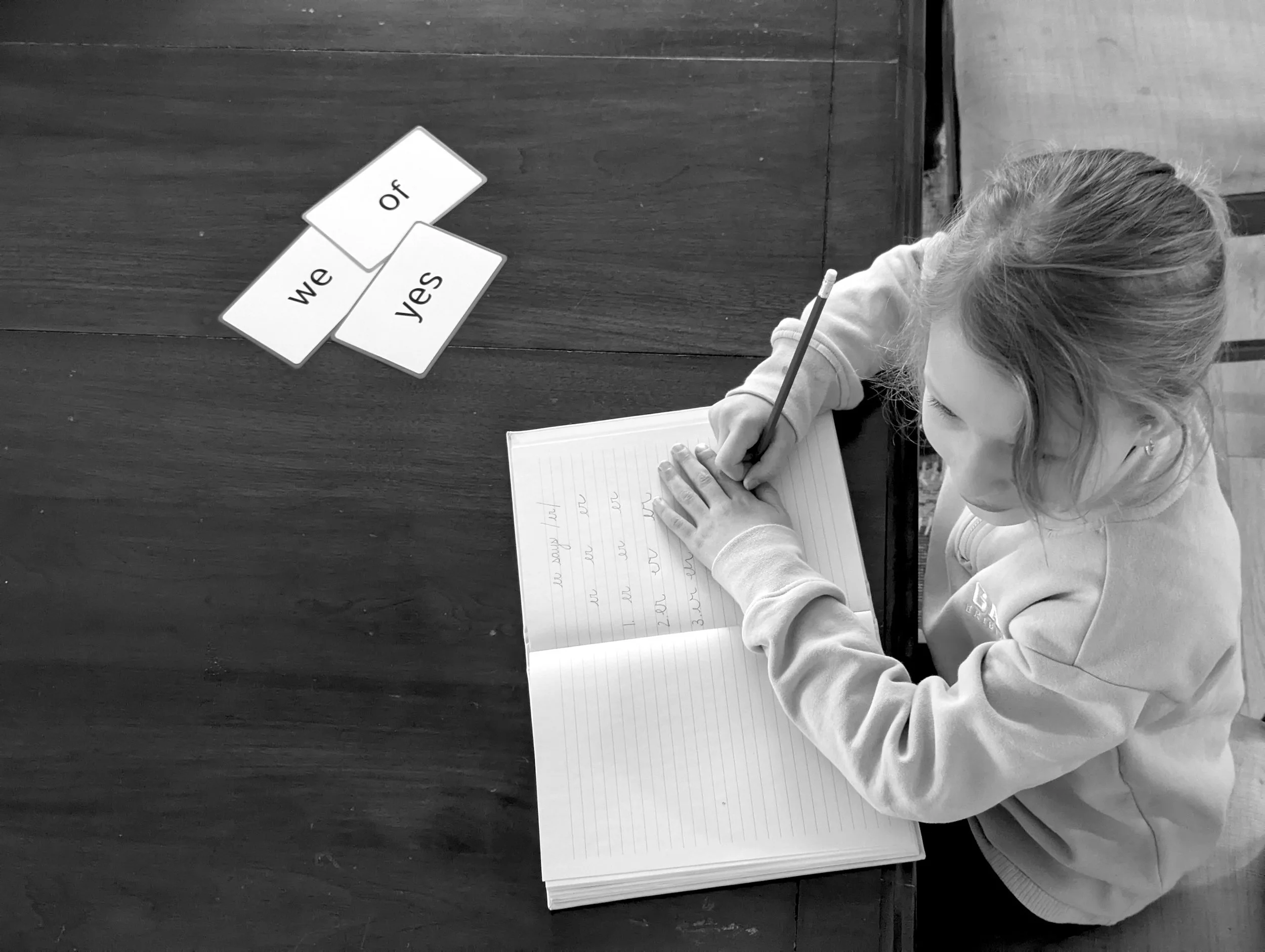 Young student practicing writing and literacy skills during a personalized tutoring session in Halifax, Nova Scotia