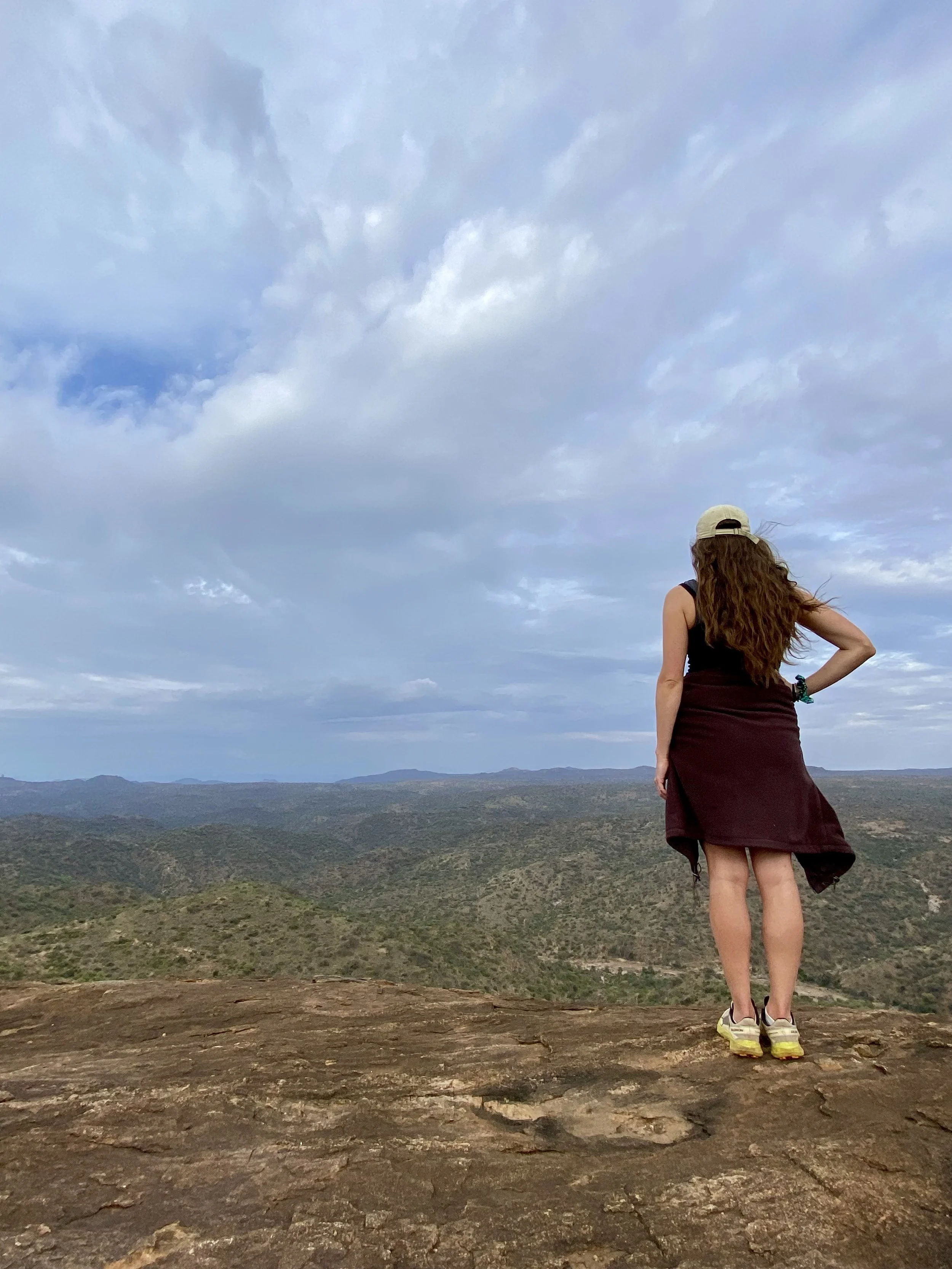 Georgie looking out off a rock in Laikipia, Northern Kenya