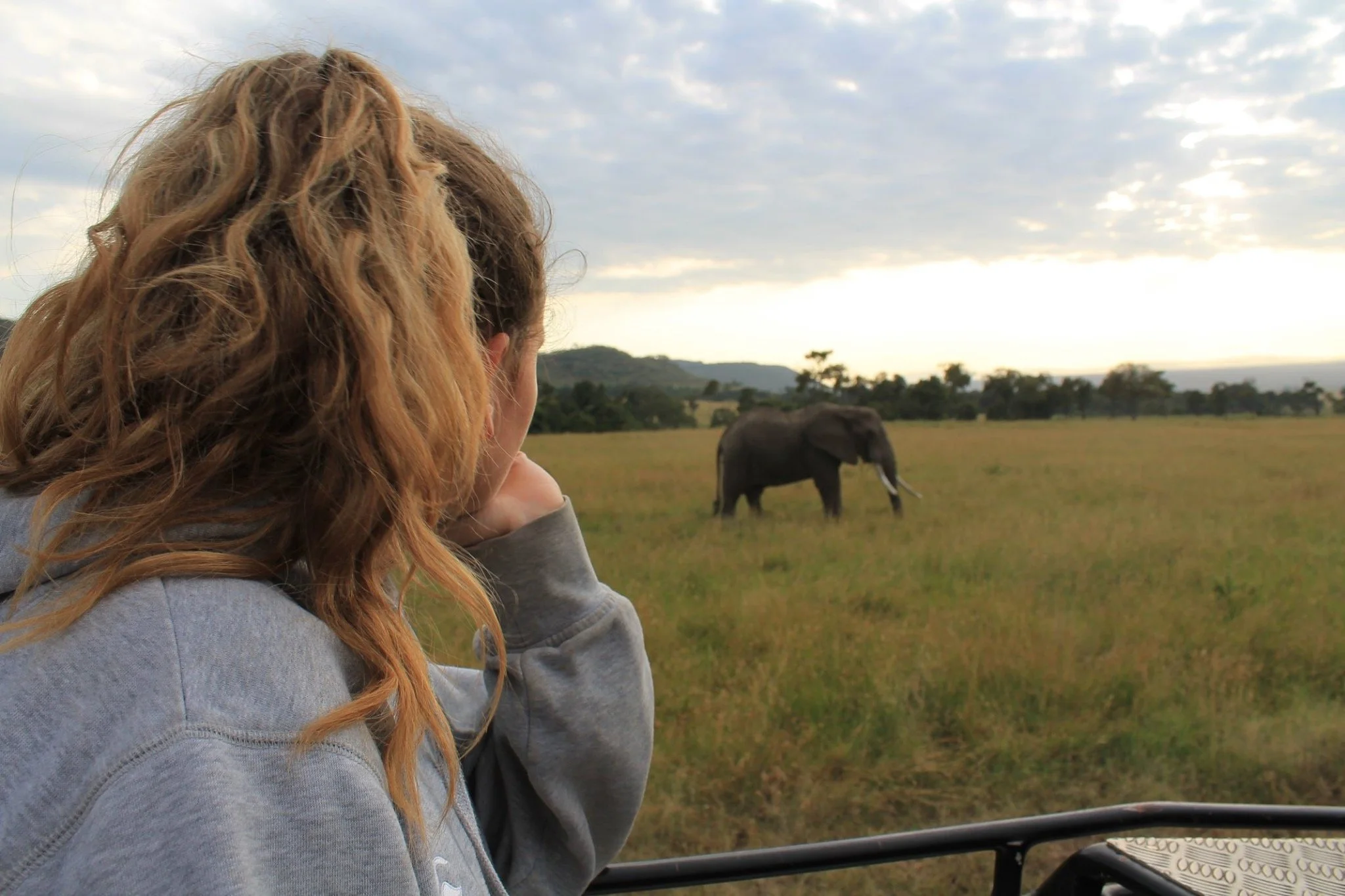 Georgie watching an elephant in the Masai Mara