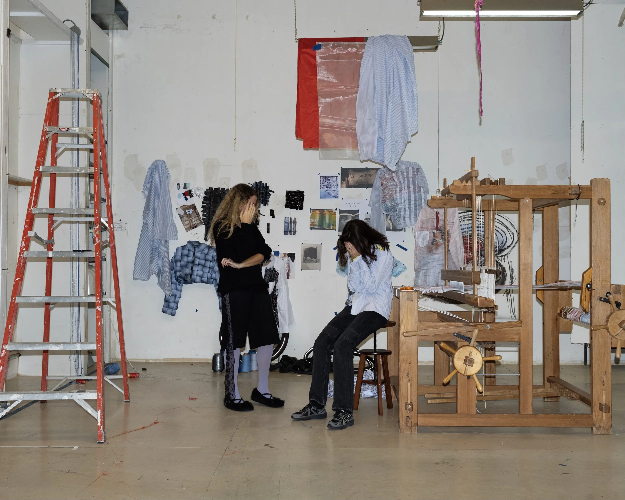 Constanca and Marie at the loom Laughing.jpg