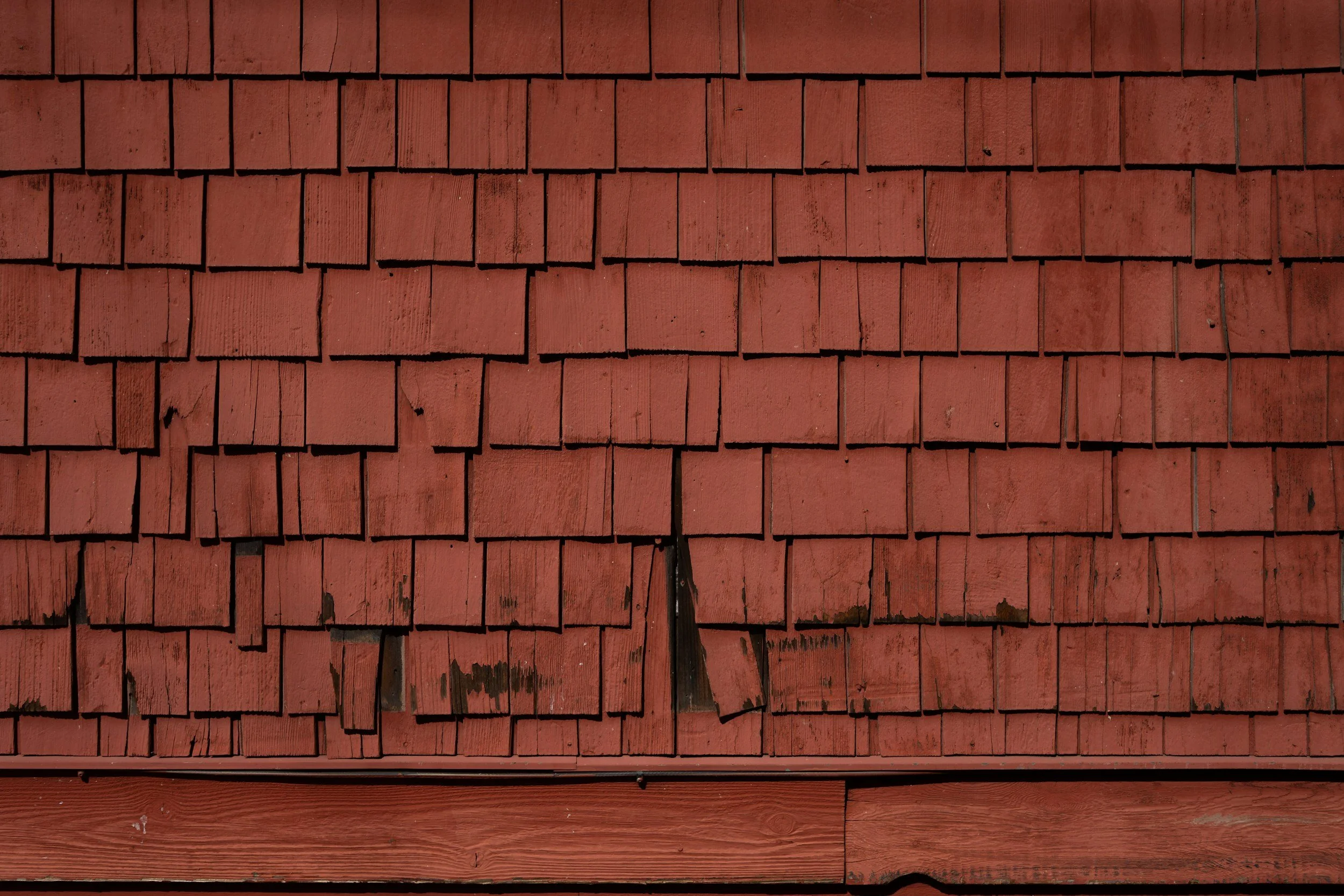 Damaged roof covering requiring a specific defect inspection