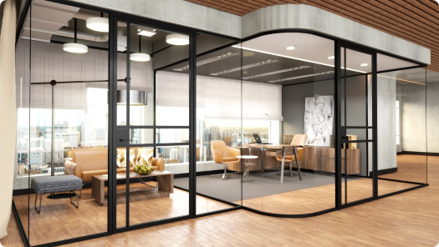 Modern office lounge area with glass walls, beige couches, wooden tables, and large windows letting in natural light.