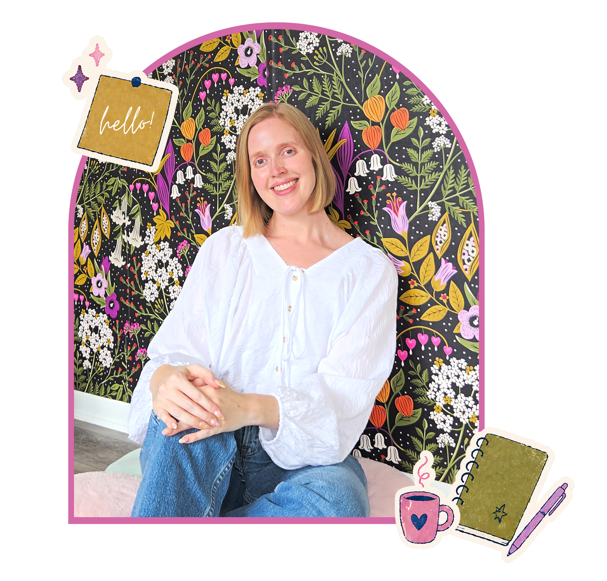 A smiling woman with shoulder-length blonde hair, wearing a white blouse, sitting cross-legged on a light-colored carpet in front of a colorful, floral background with drawings of a notebook, cup, and pencils.