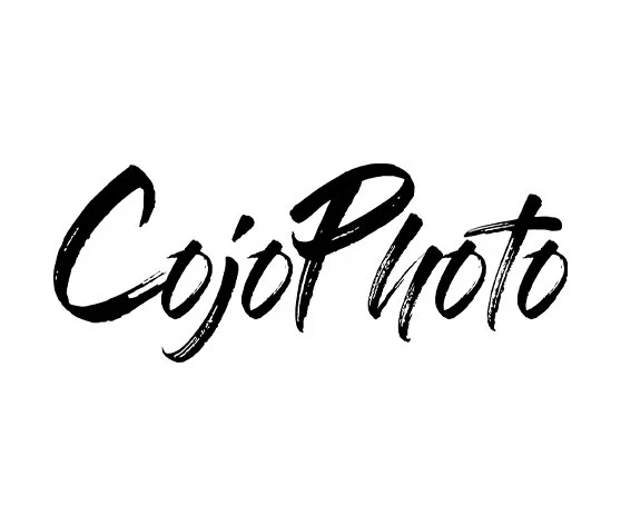 Stylized black text that reads 'CojoPhoto' on a white background.
