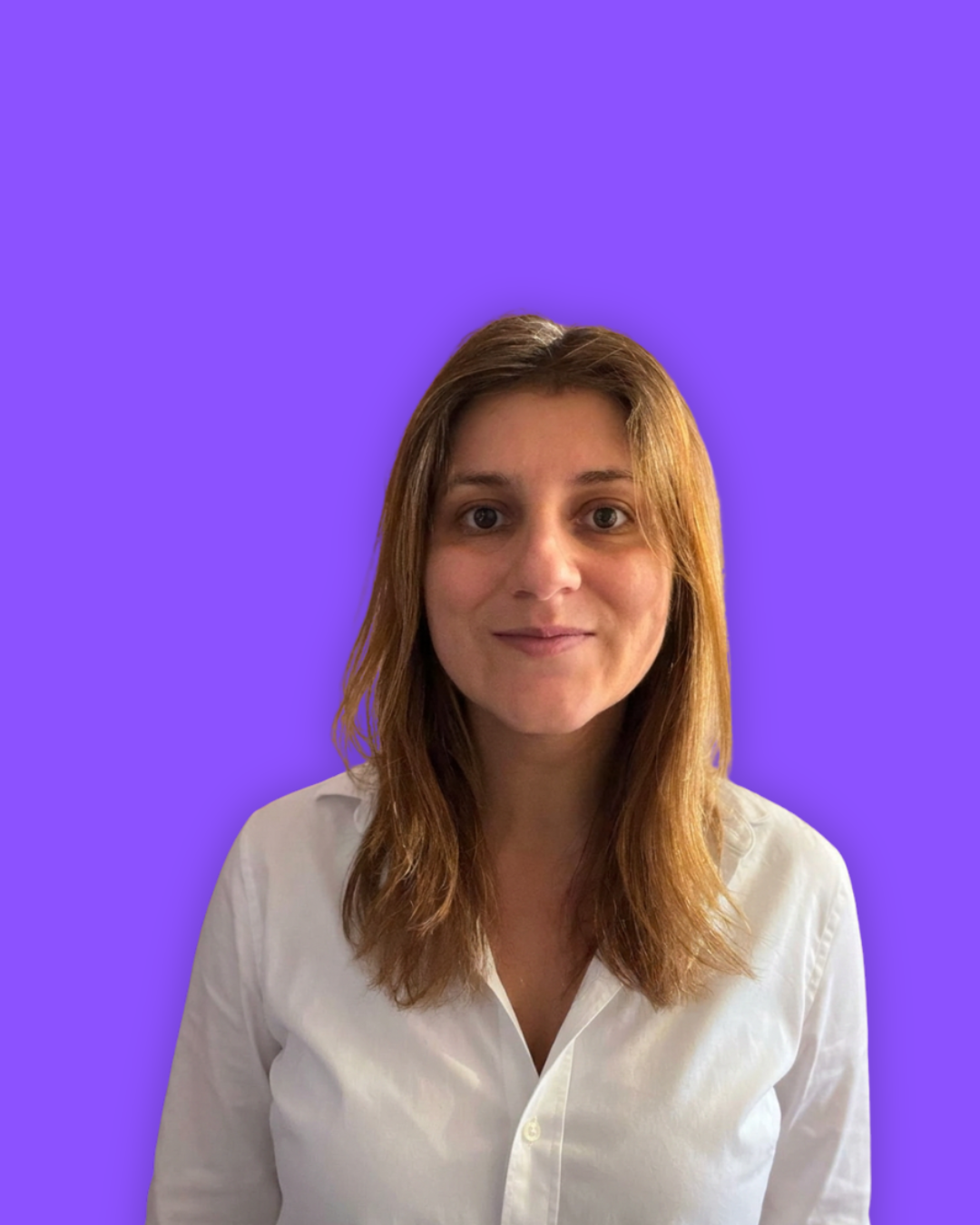 Portrait of a woman with shoulder-length brown hair wearing a white shirt, set against a purple background.
