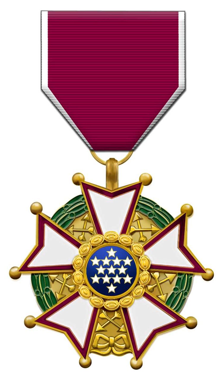 Medal with a red ribbon and a star-shaped design featuring a blue circle with white stars at the center, surrounded by gold and green decorative elements.