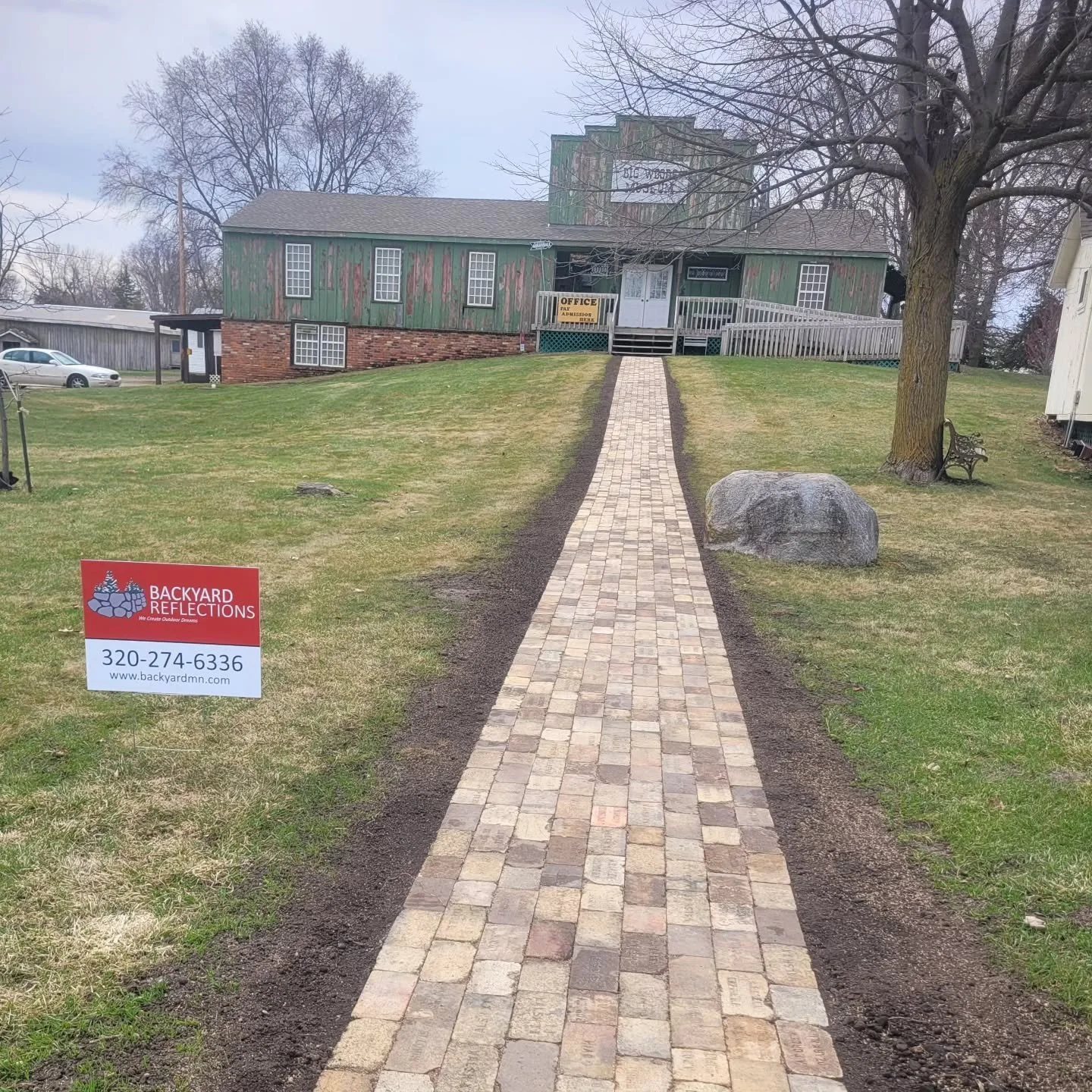 To kick off the season, we donated labor and materials to the Pioneer Park to redo a couple of their overgrown, irregular paver walkways. The main walkway was redone using vintage pavers from the original two walkways.  The second was done in pavers 