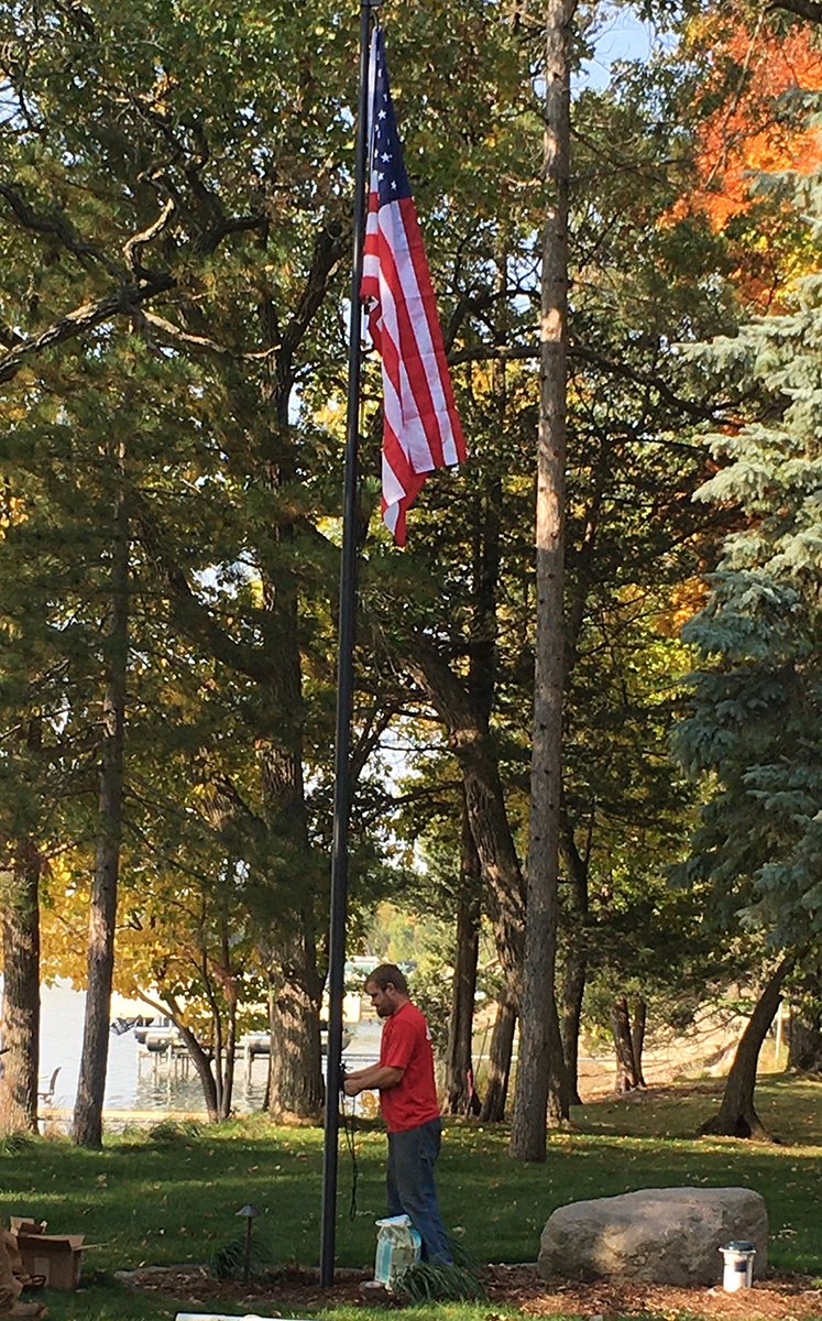 Flagpole install at Champeau cropped-2.jpg