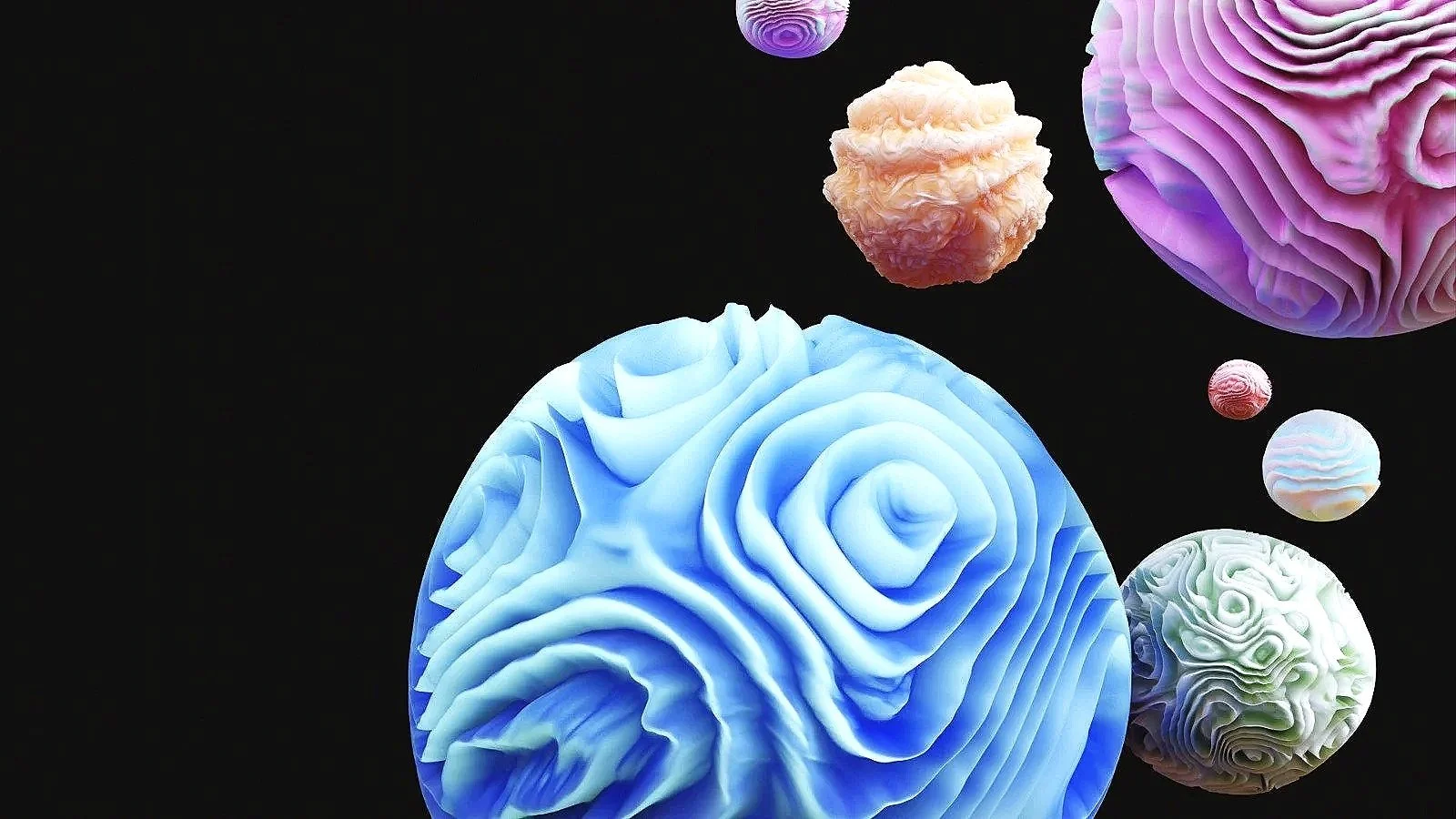 Colorful abstract 3D-rendered spheres with textured, swirling surfaces floating in black space.