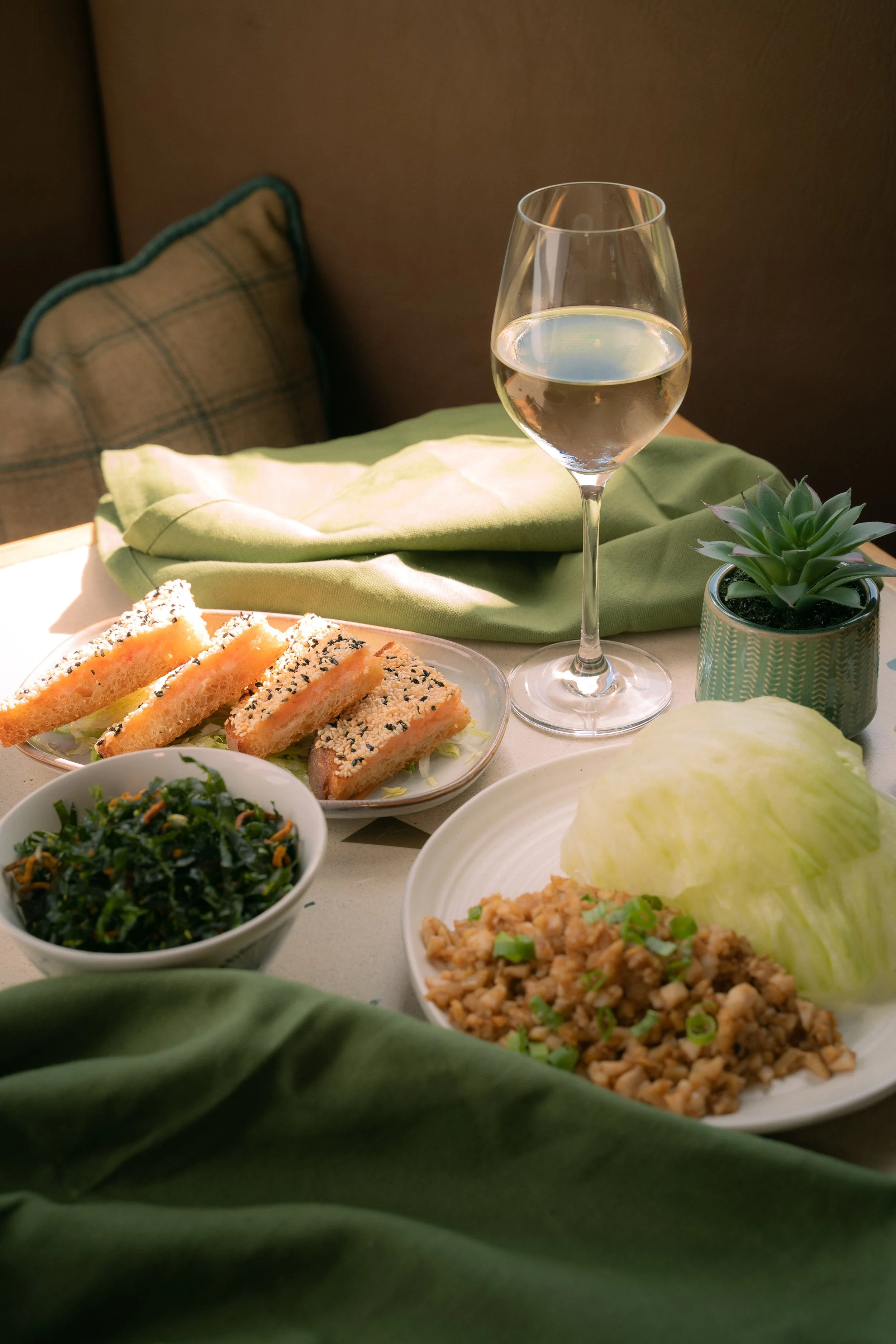 Prawn toast with a glass of white wine
