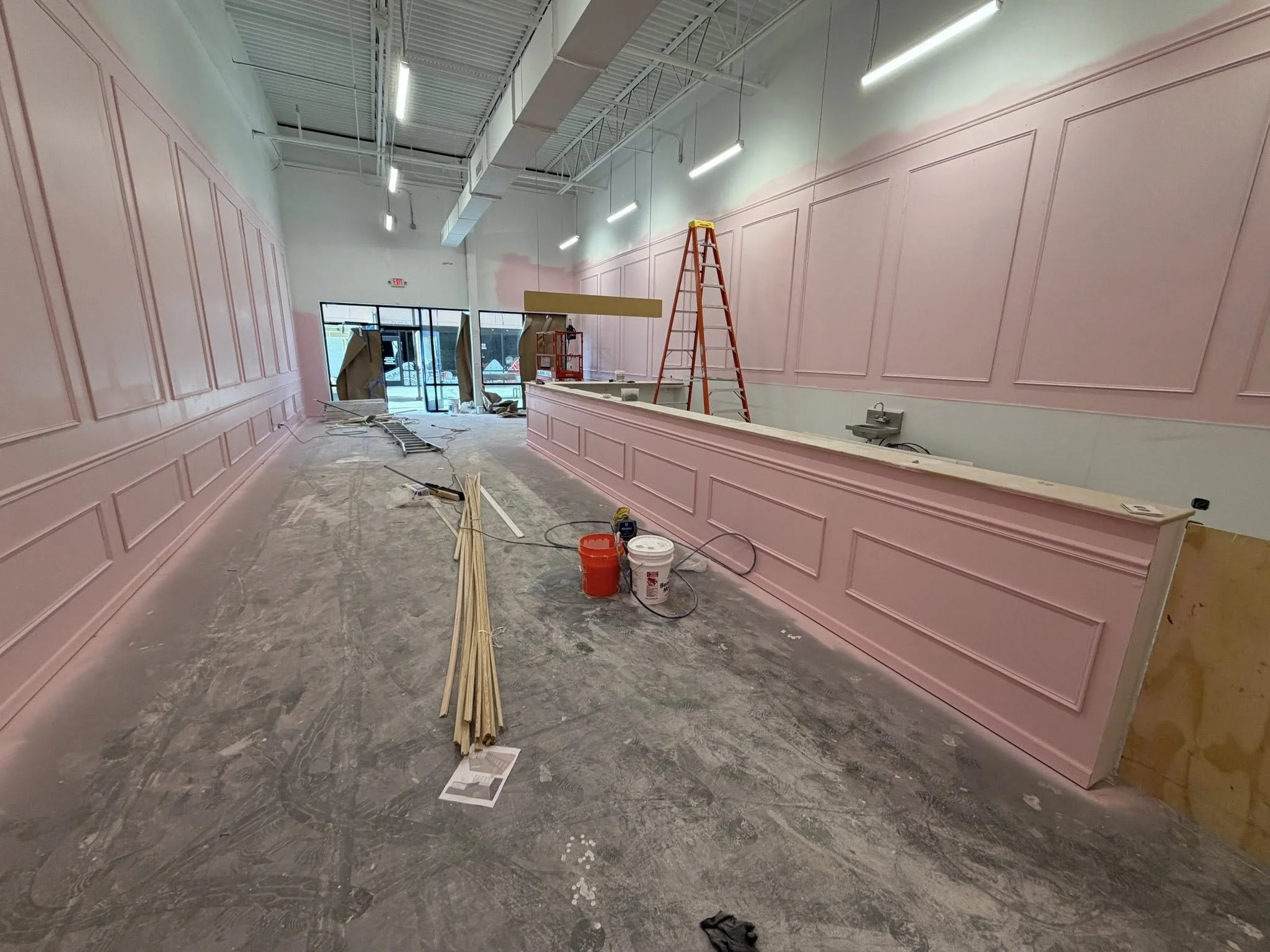 In progress commercial renovation with new wainscoting and paint