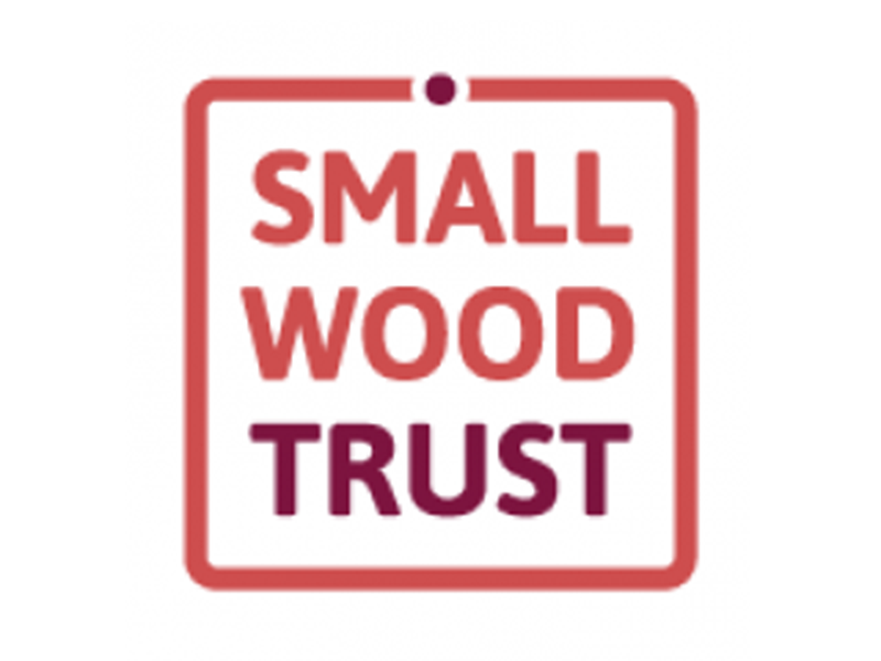 Logo with the words "Small Wood Trust" inside a rounded square border.