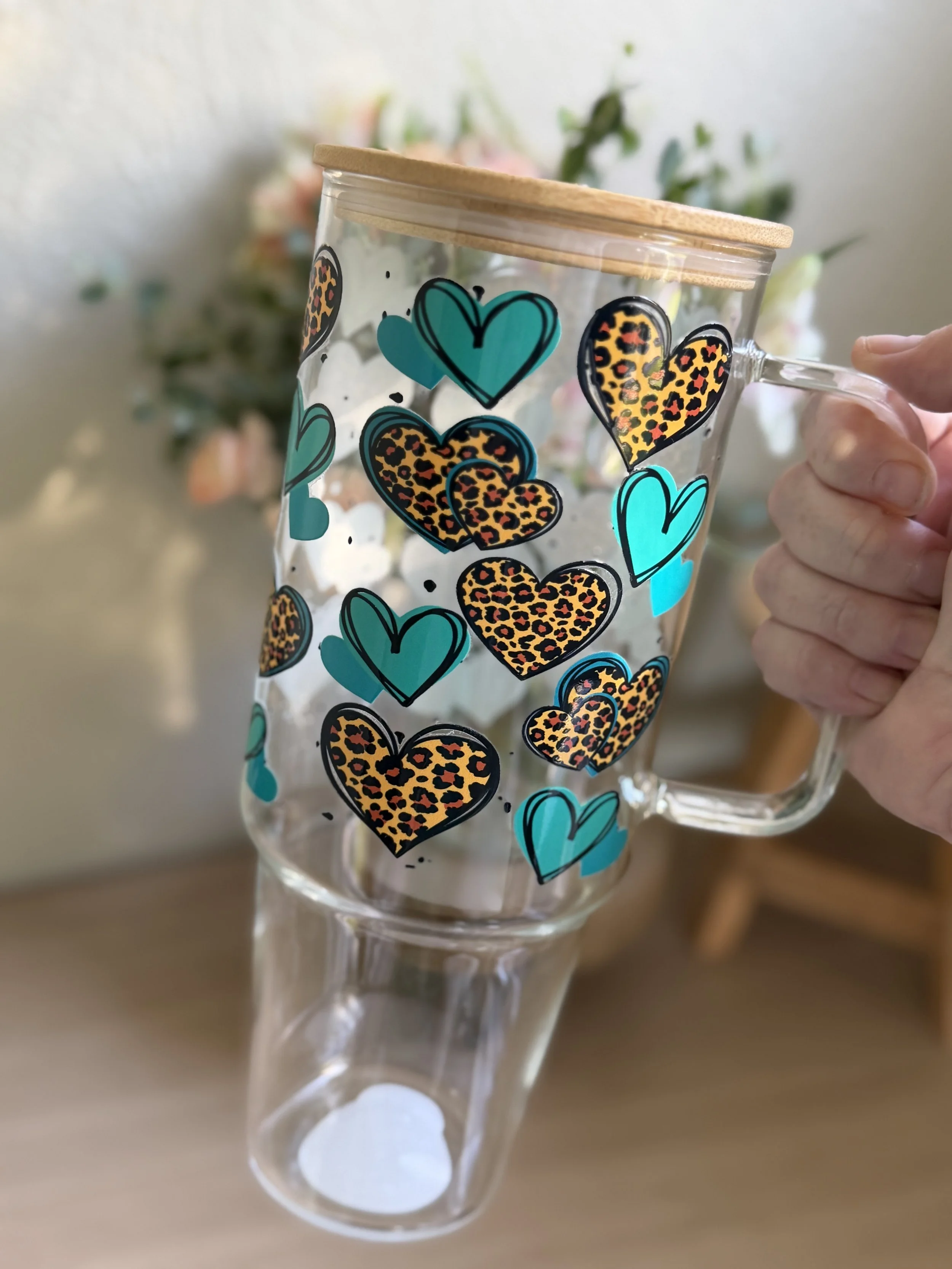 Teal Leopard Print Hearts 40oz tumbler with handle.jpeg